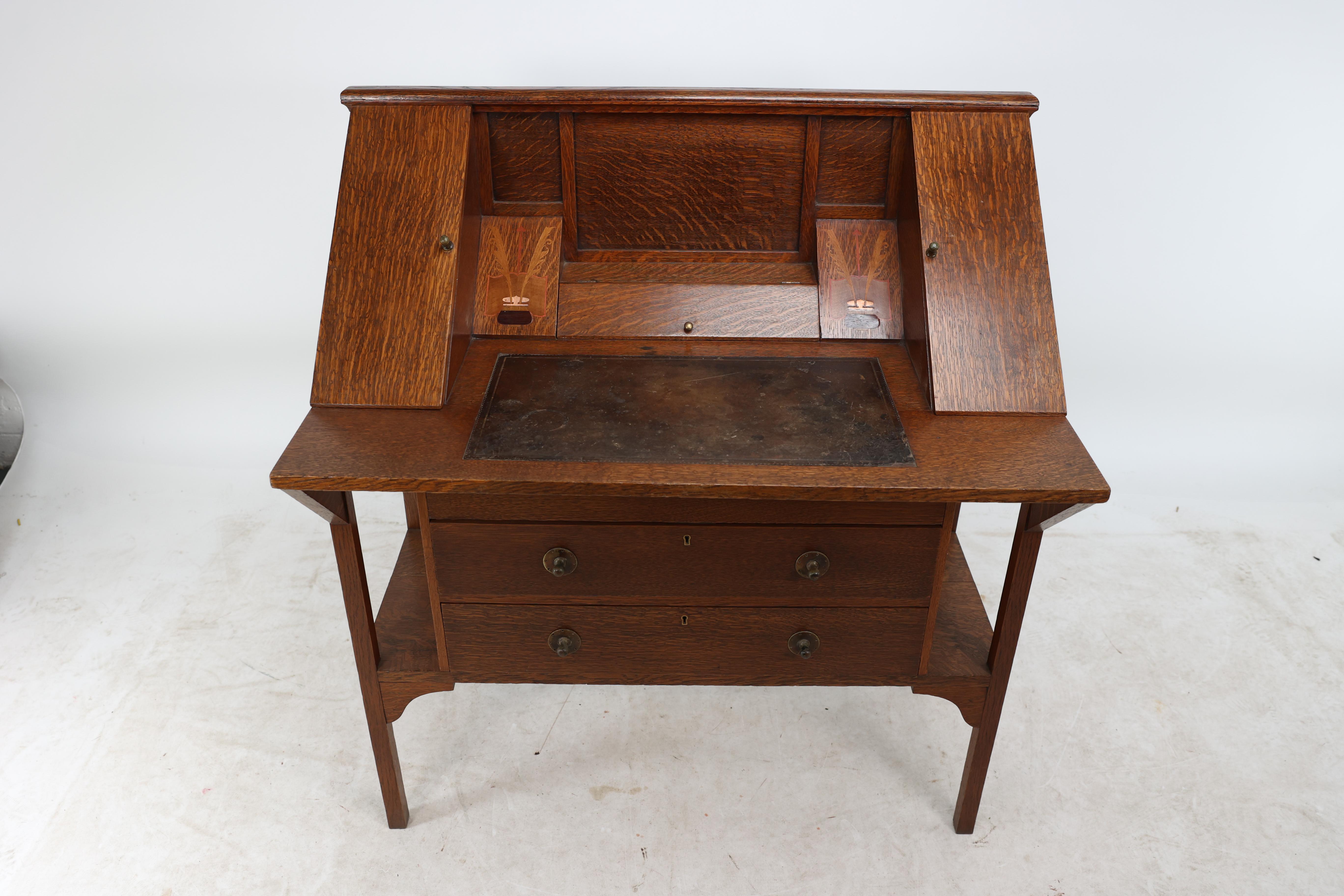 Hand-Crafted G M Ellwood for J S Henry. An Arts & Crafts oak writing desk For Sale