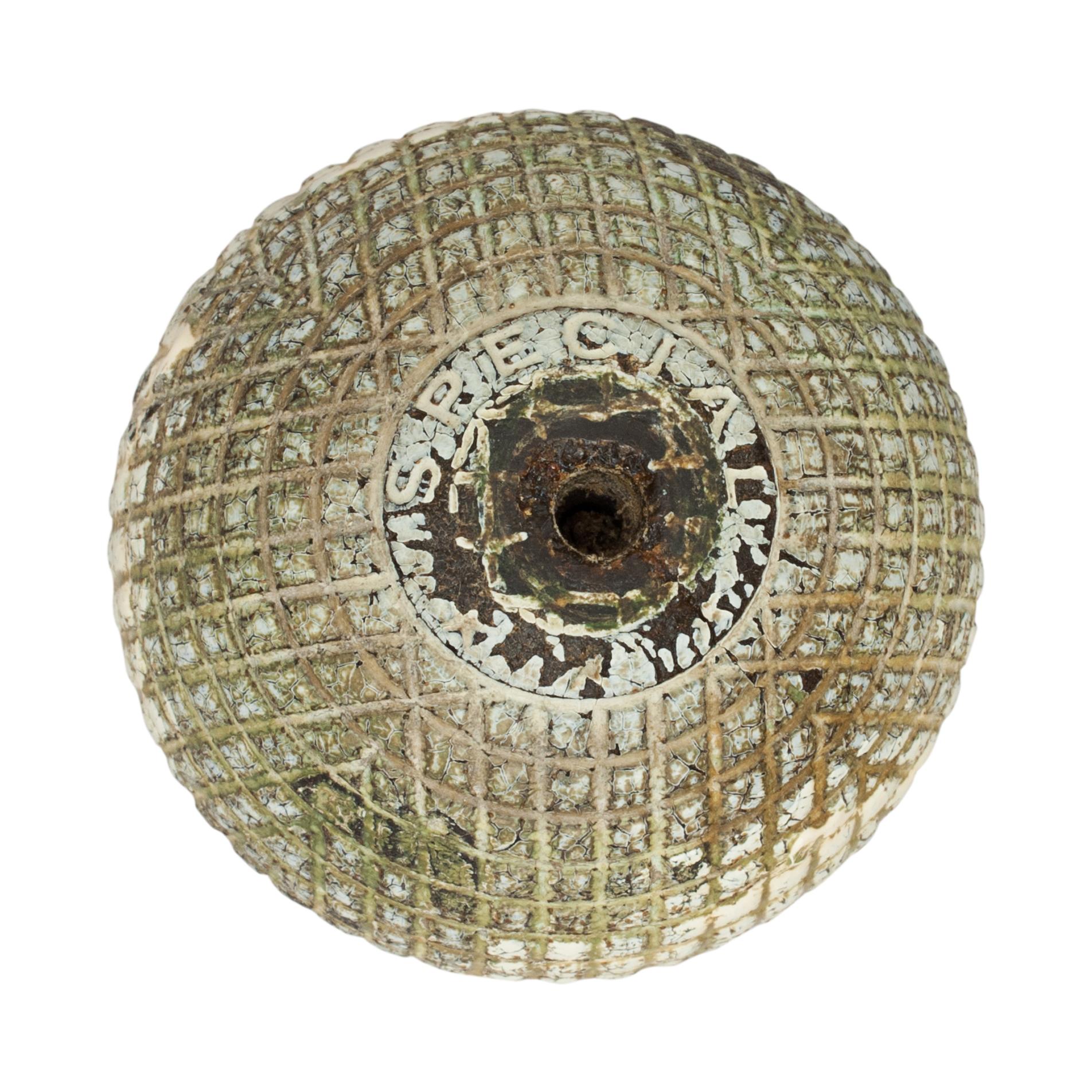 Gutta Percha Golf Ball, G. McHardy Special.
A moulded mesh patterned white Gutta Percha golf ball in original condition manufactured by G. McHardy. The 1890's Gutty ball has had a hole drilled into the bottom so may have been mounted on a trophy at