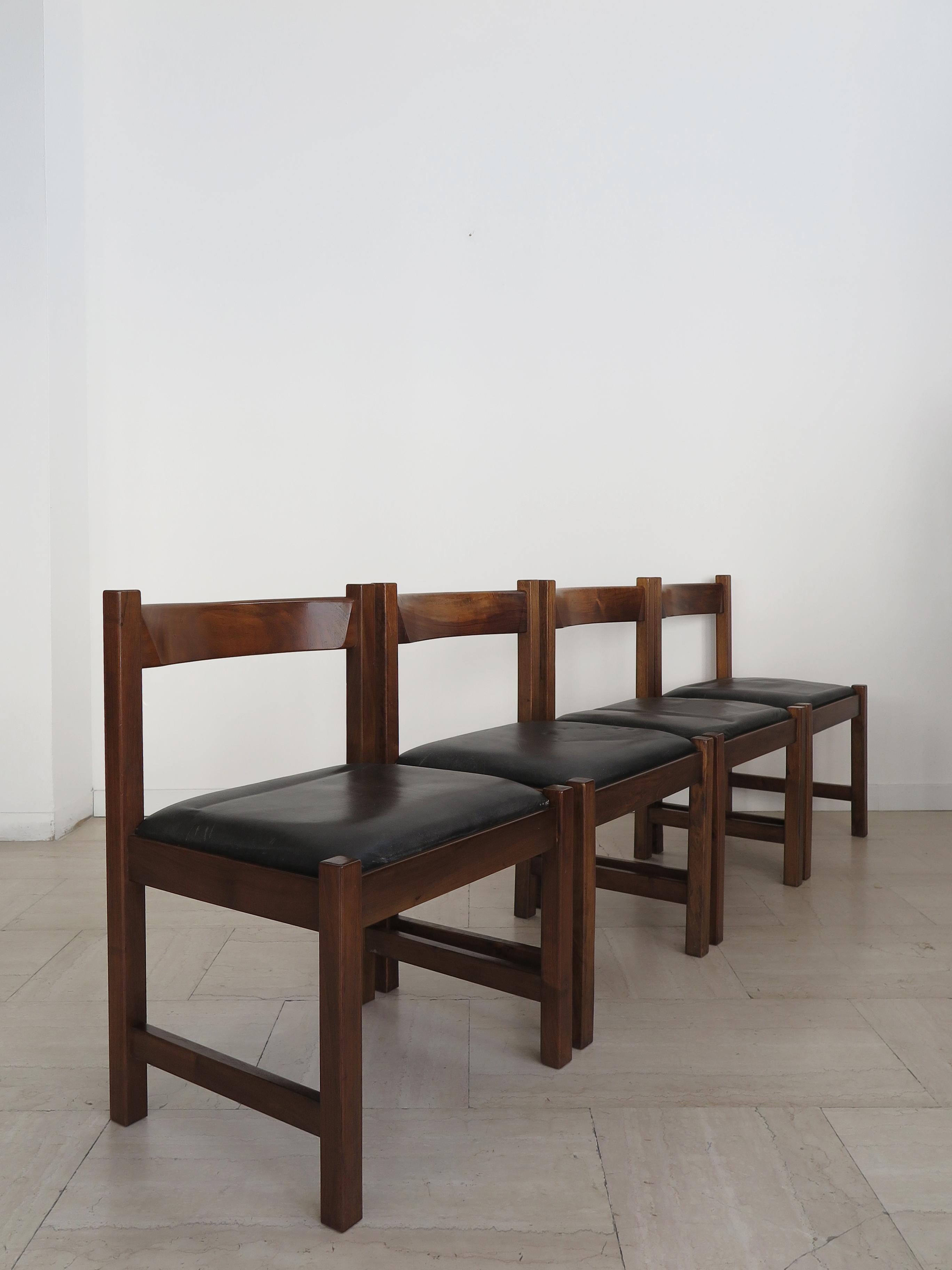 Set of four dining chairs from the Torbecchia S.20 series designed by Giovanni Michelucci and produced by Poltronova with walnut frame and leather upholstered seat, made in Italy 1964.
G. Michelucci mark branded on each chair.

The chairs are in