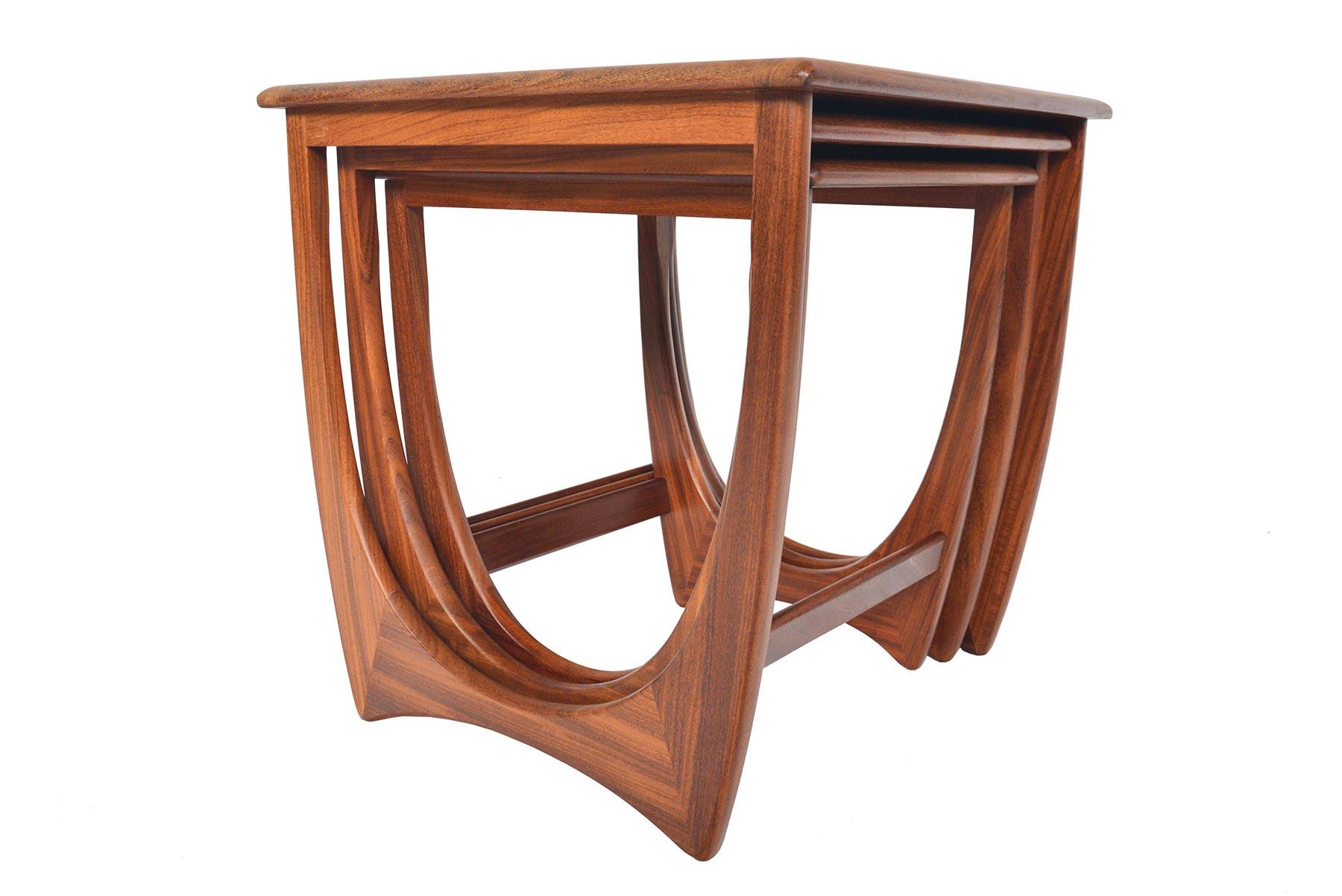 This timeless set of Mid-Century Modern G plan Astro teak nesting tables was designed by Victor Wilkins in the 1960s. Gorgeous design and exceptional construction throughout. In excellent original condition.
 
 