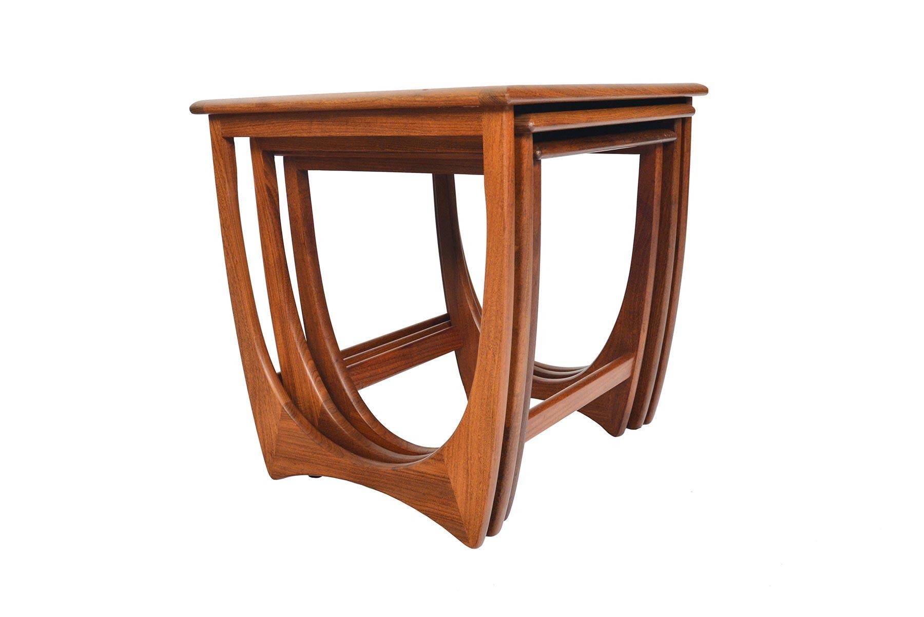 This timeless set of Mid-Century Modern G Plan Astro teak nesting tables was designed by Victor Wilkins in the 1960s. Gorgeous design and exceptional construction throughout. In excellent original condition.