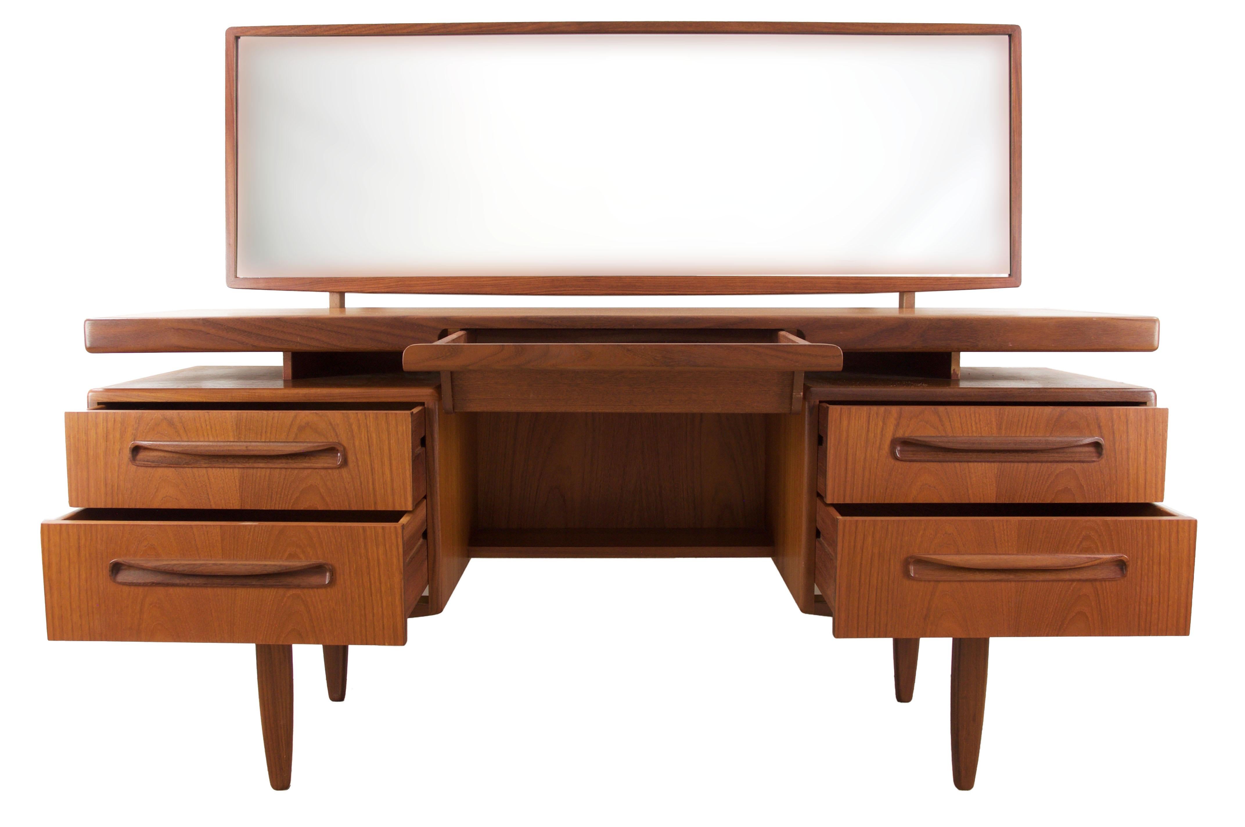 Beautiful five-drawer 1960s teak dressing table or vanity by G-Plan in outstanding condition. Designed by Victor Bramwell Wilkins for G-Plan during the Mid-Century Modern era in Britain. Bramwell was well known for his 