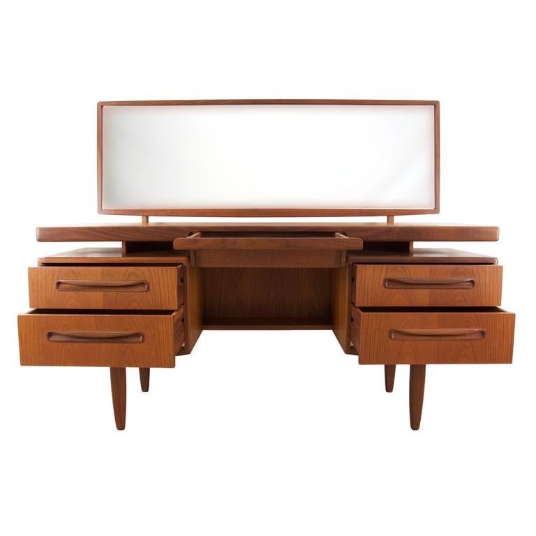 Beautiful five-drawer 1960s teak dressing table or vanity by G-Plan in outstanding condition. Designed by Victor Bramwell Wilkins for G-Plan during the Mid-Century Modern era in Britain. Bramwell was well known for his 