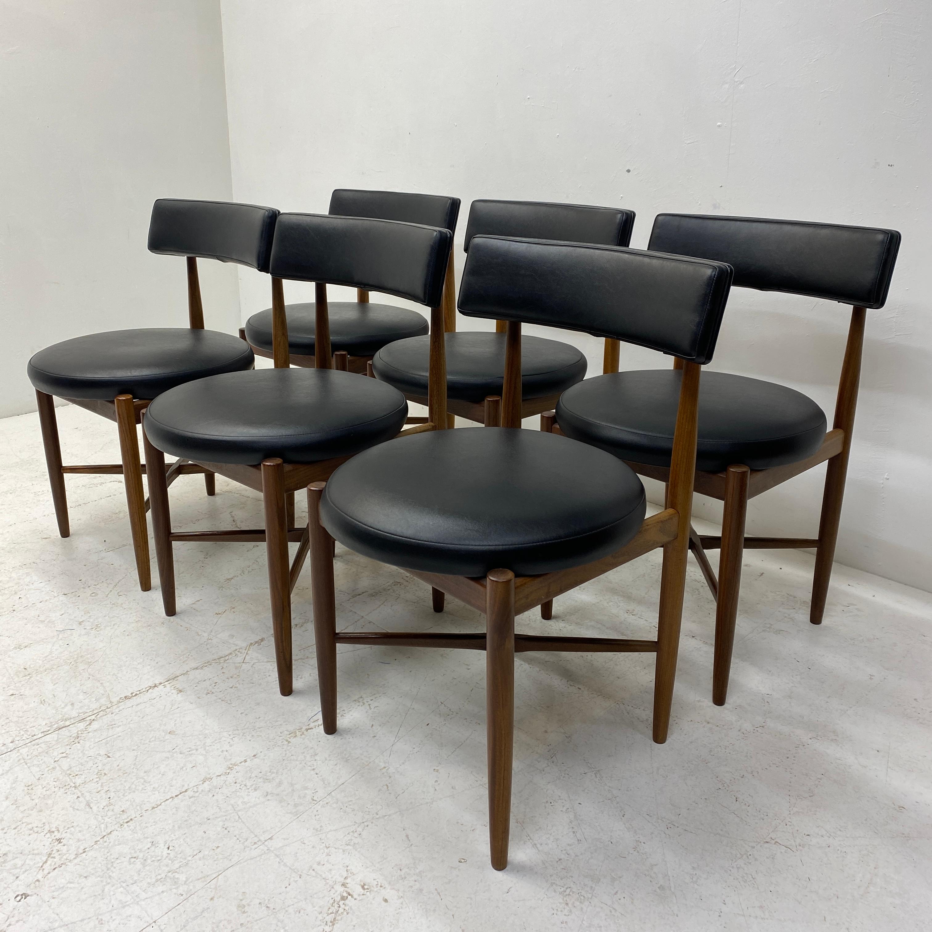 A fabulous set of 6 midcentury Kofod Larsen for G Plan teak dining chairs in superb original condition with original G Plan black vinyl upholstery throughout. The dining chairs are the most sought after design from the 1960’s fresco range. The