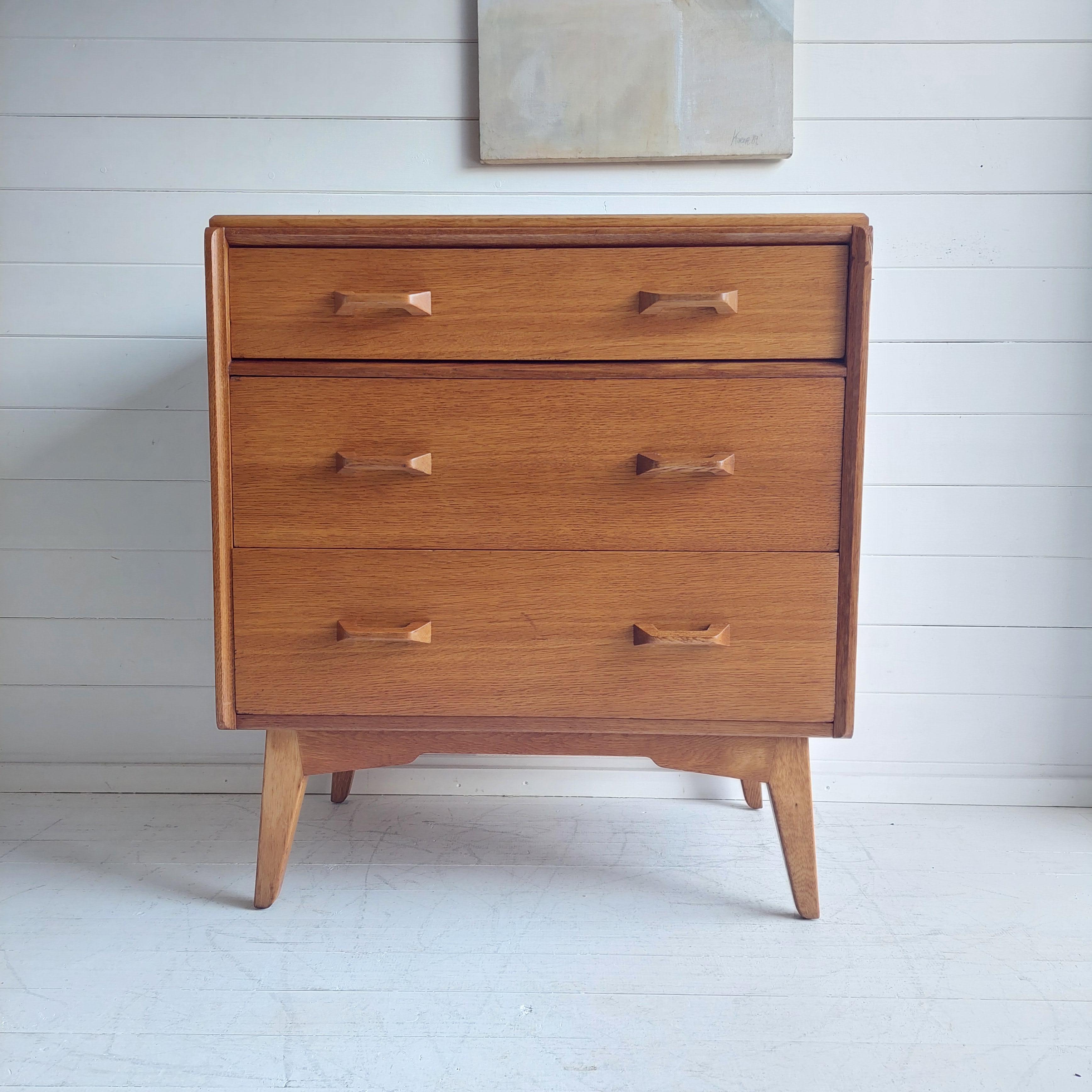 This particular piece is from the 'Brandon' range designed by V.B Wilkins who stated that these pieces of furniture had a look that could be placed in any room of the house and not look out of place.
A set of oak G Plan E Gomme drawers from the