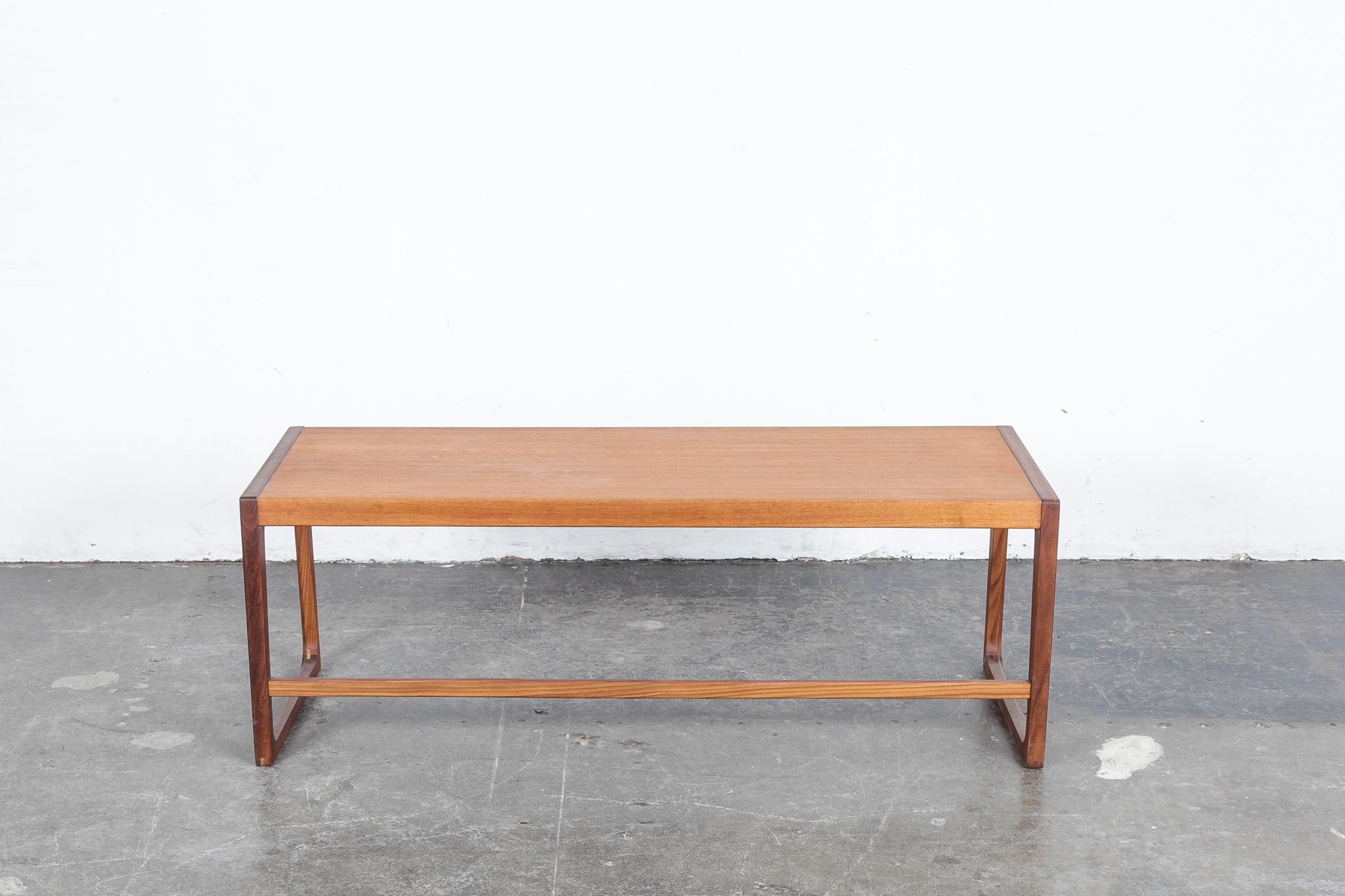 English midcentury two-tone teak and afromosia sleigh leg rectangular coffee table, newly refinished in a natural teak oil, 1950s, UK.

 