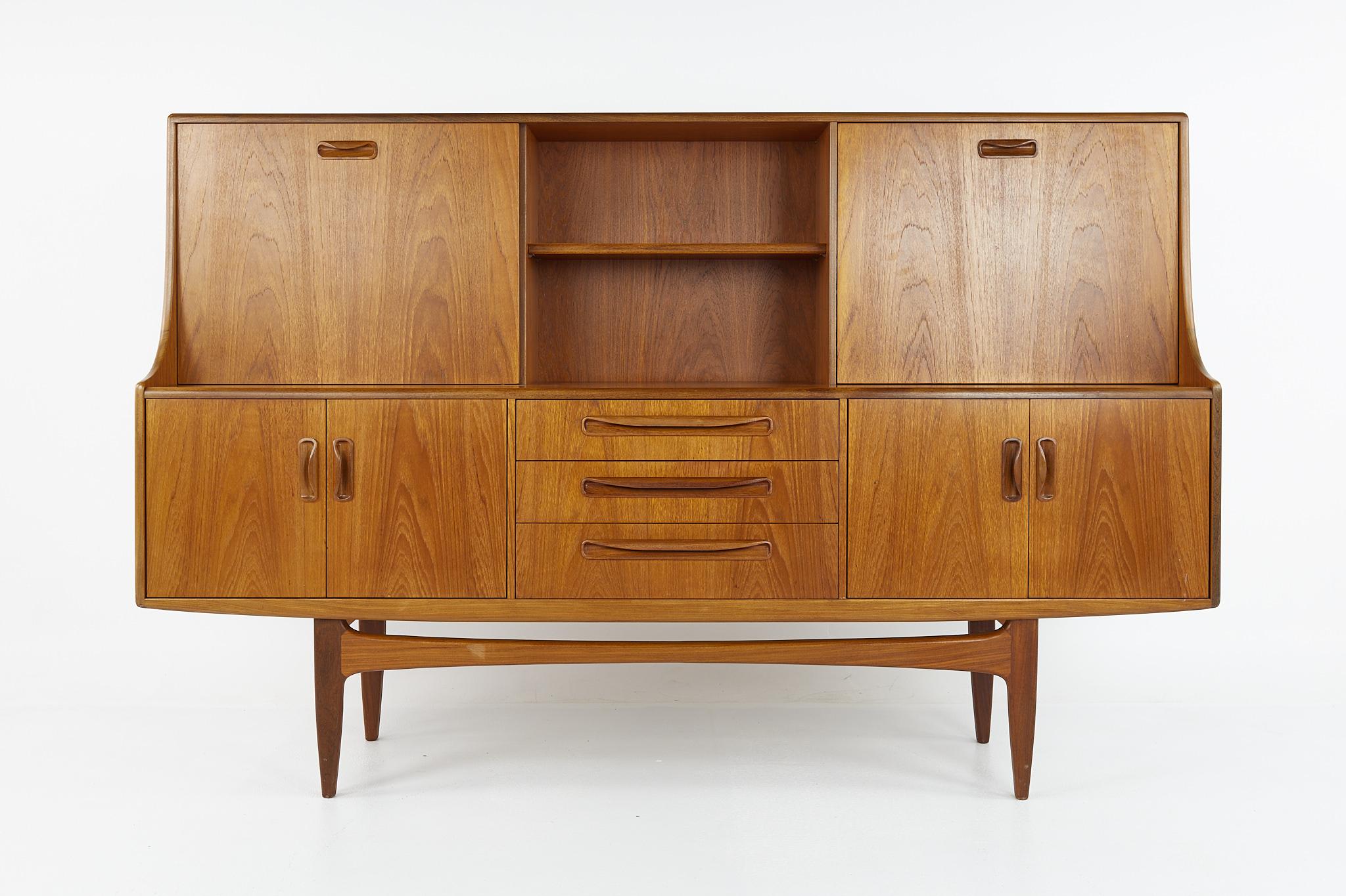 G Plan mid century teak credenza bar cocktail cabinet

This credenza measures: 74 wide x 18 deep x 48 inches high

?All pieces of furniture can be had in what we call restored vintage condition. That means the piece is restored upon purchase so