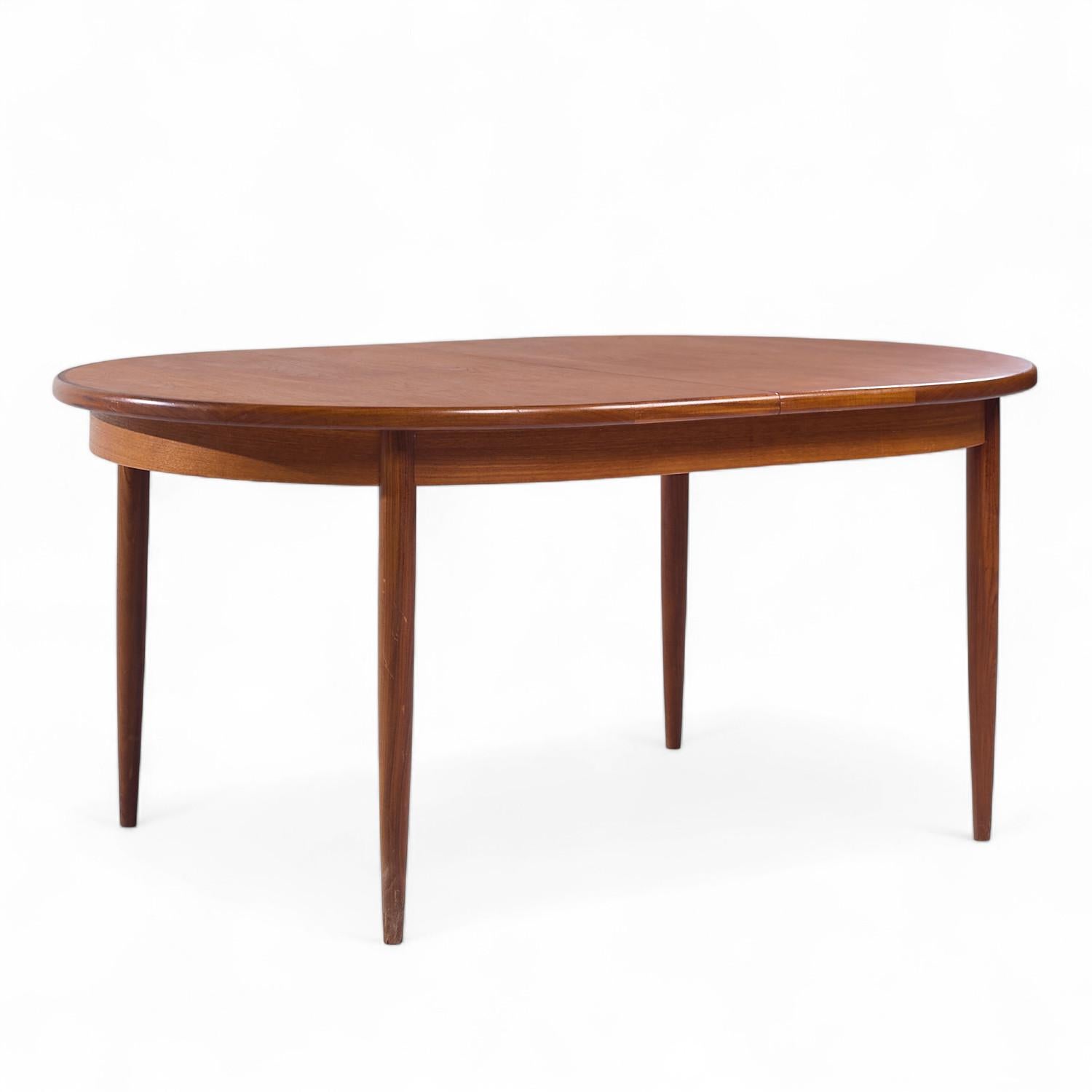 Teak G-Plan Tavolo da pranzo allungabile a foglie nascoste in teak del metà del secolo scorso in vendita
