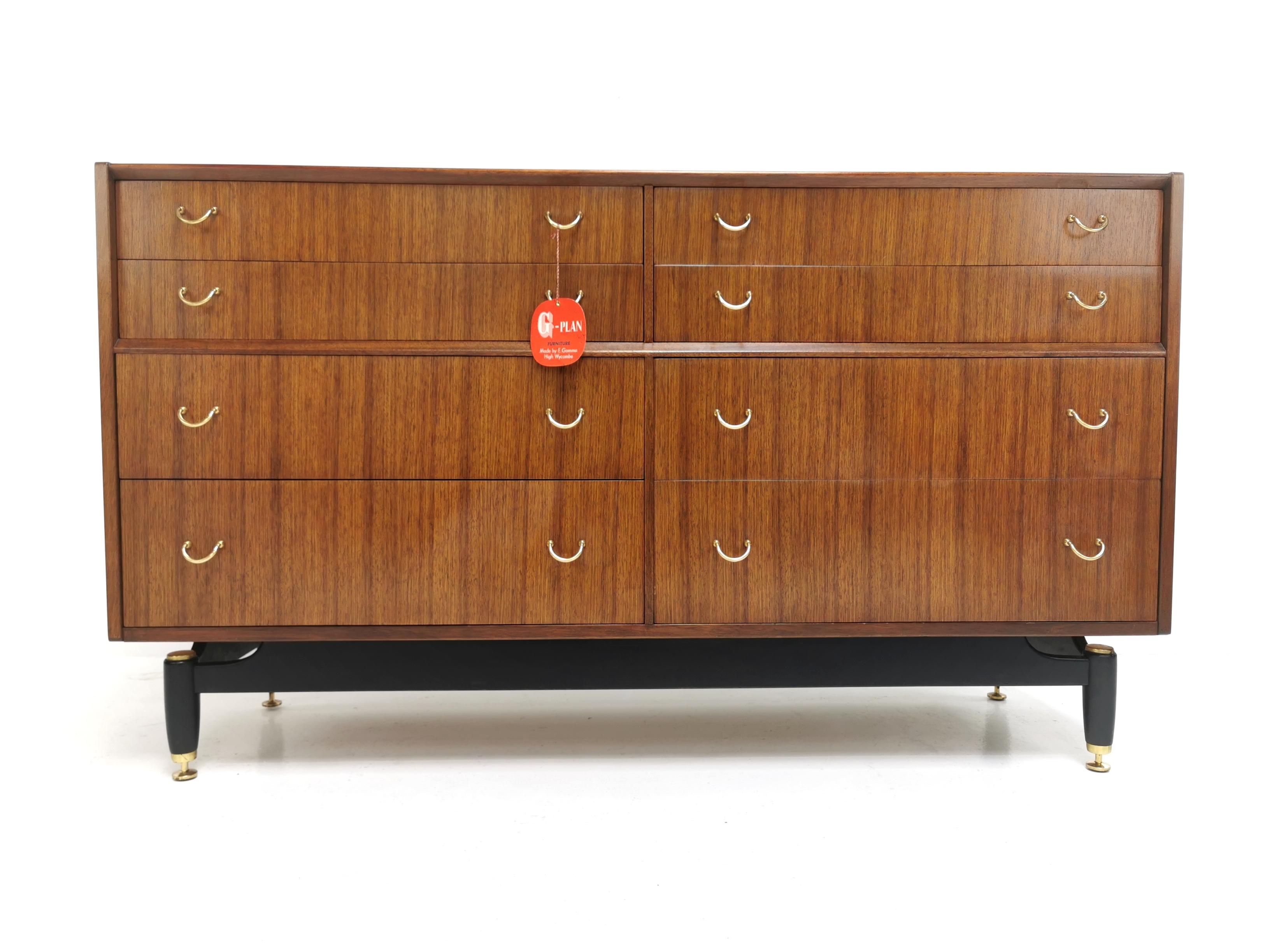 G Plan chest of drawers

A chest of eight drawers raised on an ebonized base with brass cup feet with original brass drawer pulls. 

Manufactured by Ernest Gomme, G Plan as part of the “Tola” range.

Includes the original g plan tag,

circa