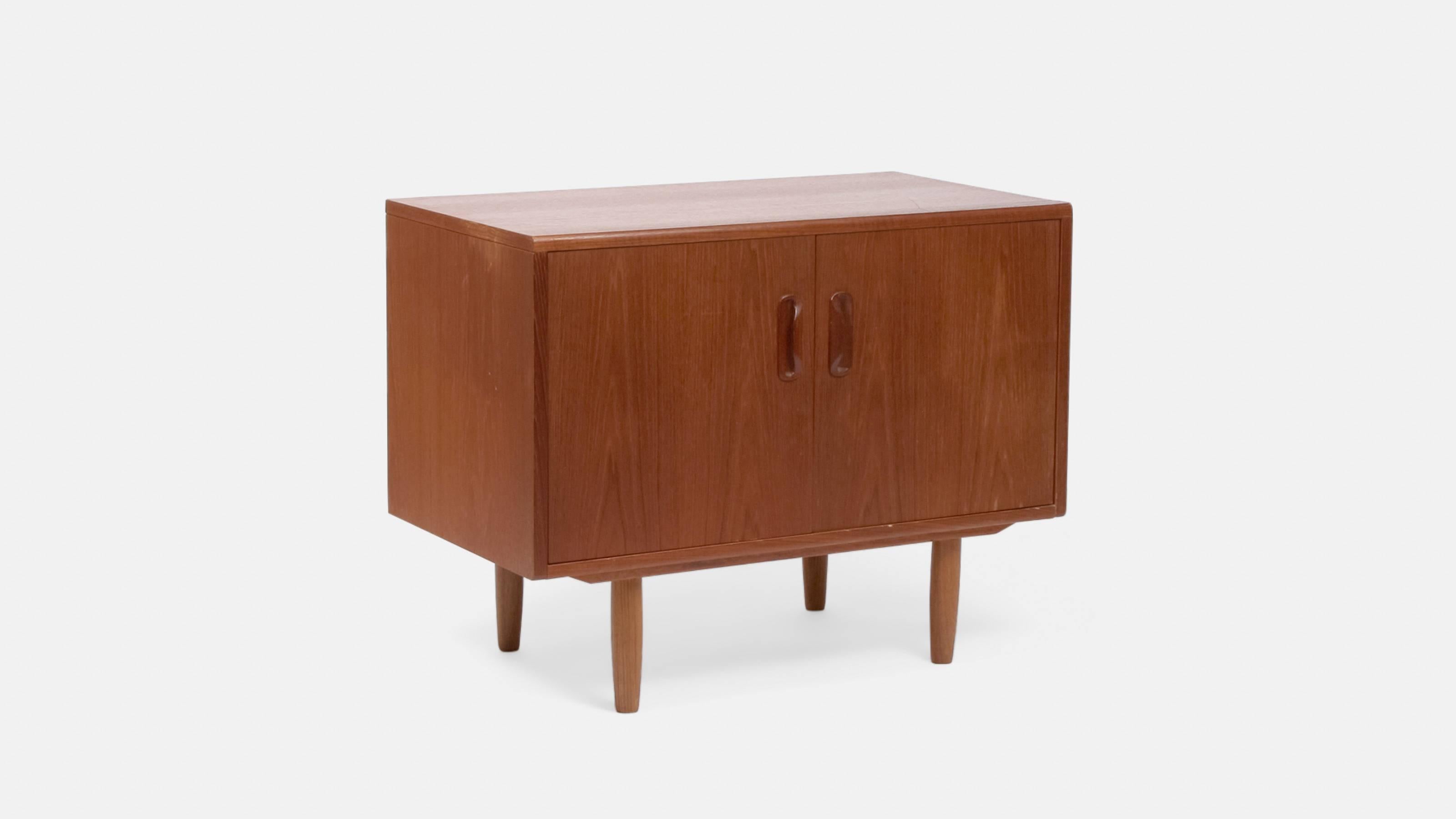 A 1960s English made G Plan teak two-door side table or bedside cabinet designed by legendary post-war British brand, G-Plan.