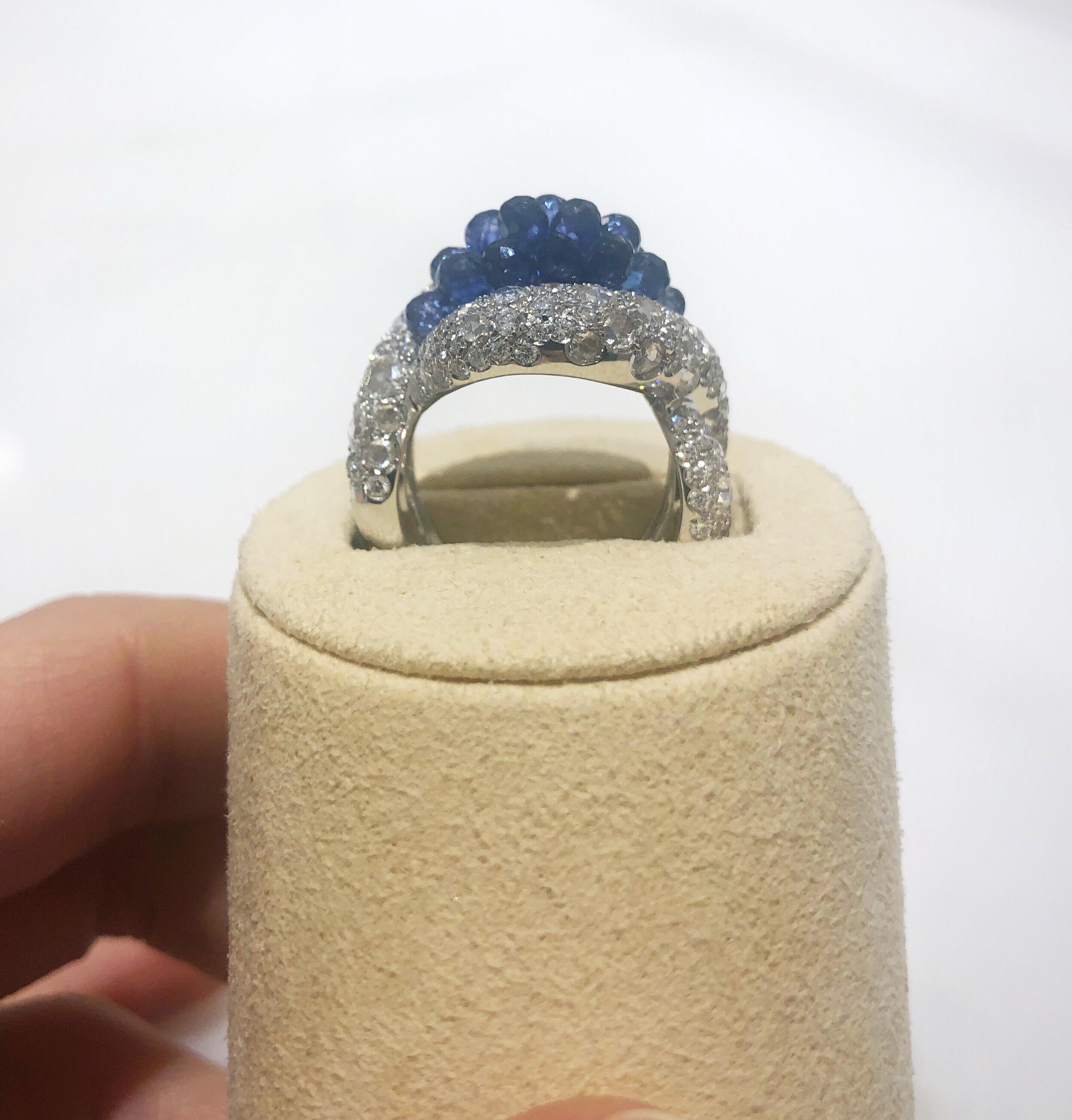 gold ring with diamonds and sapphire briolette