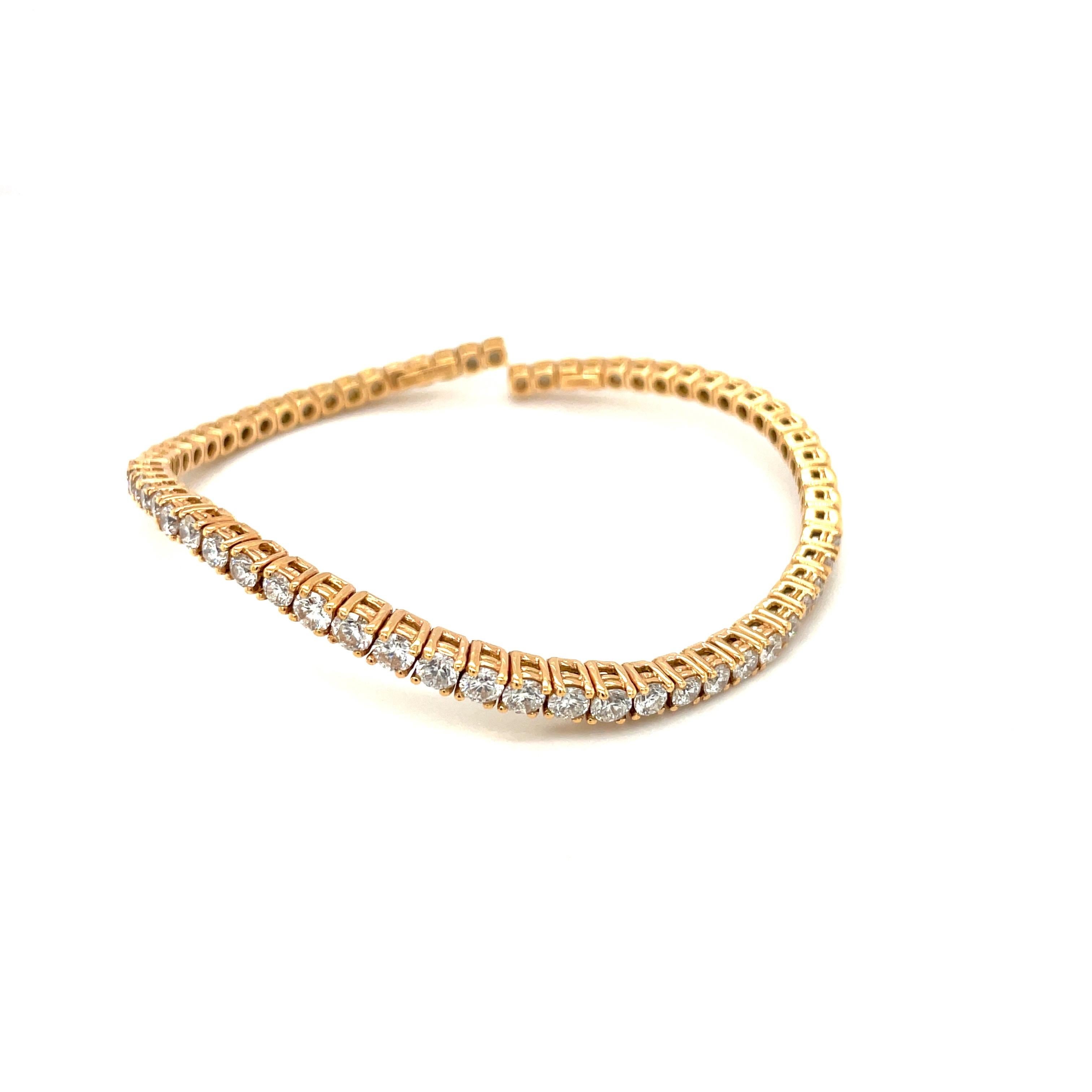 Made exclusively for Cellini by G. Verdi of Italy. This 18 karat rose gold curved bracelet is set with 28 round brilliant diamonds totaling 2.38 carats. The diamonds are set more than half way around so they are visible across  and on the sides of
