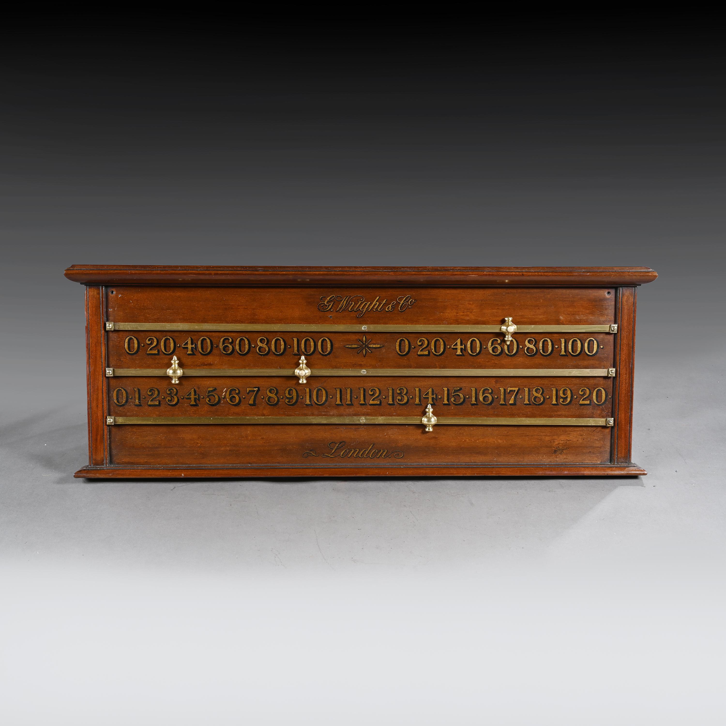 Good quality Edwardian mahogany billiards or snooker scoreboard by George Wright of London.

English, circa 1900.

The mahogany frame having gold painted lettering and numerals with brasss runners and markers.

Dimensions:

Width 35 1/2
