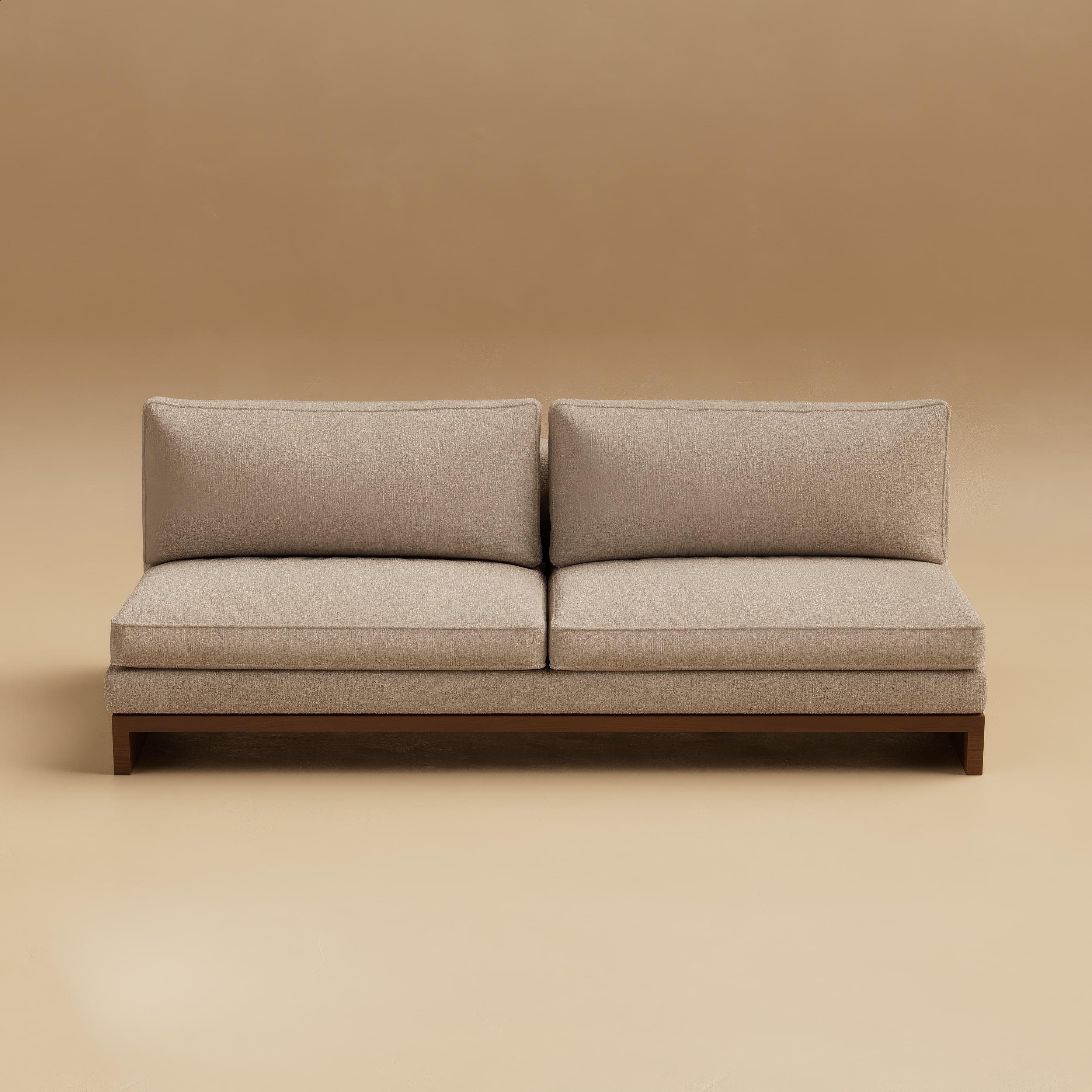 The Grant Armless Sofa distills architectural clarity into a form of quiet elegance. Rooted in Lusano’s language of geometry and precision, its silhouette is defined by clean lines and grounded proportions that exude both warmth and restraint.