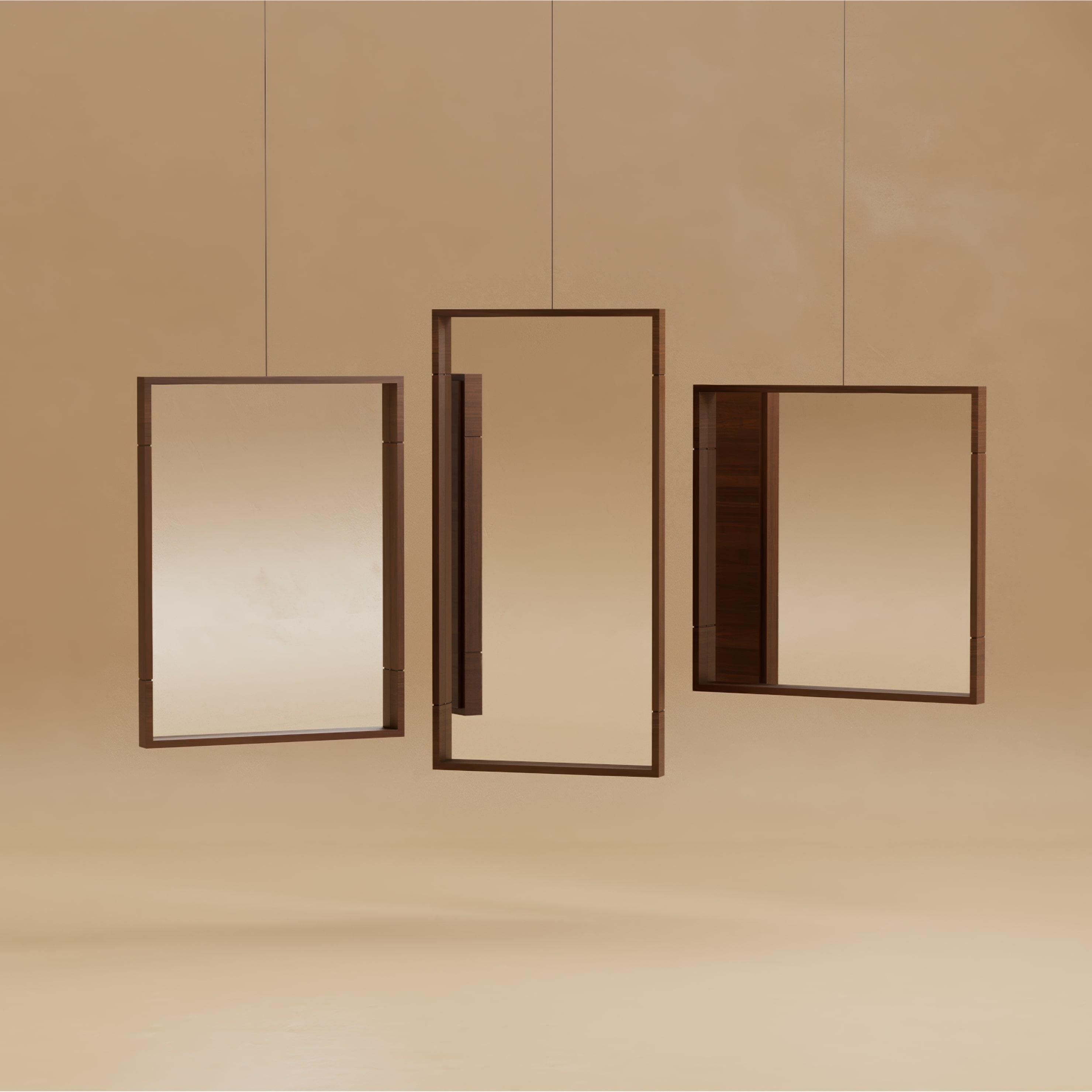 The Grant Mirror is minimal in profile yet architectural in effect. Walnut framing, detailed with directional grain shifts and Lusano’s signature notch, transforms reflection into a sculptural moment. It is understated but intentional, designed as