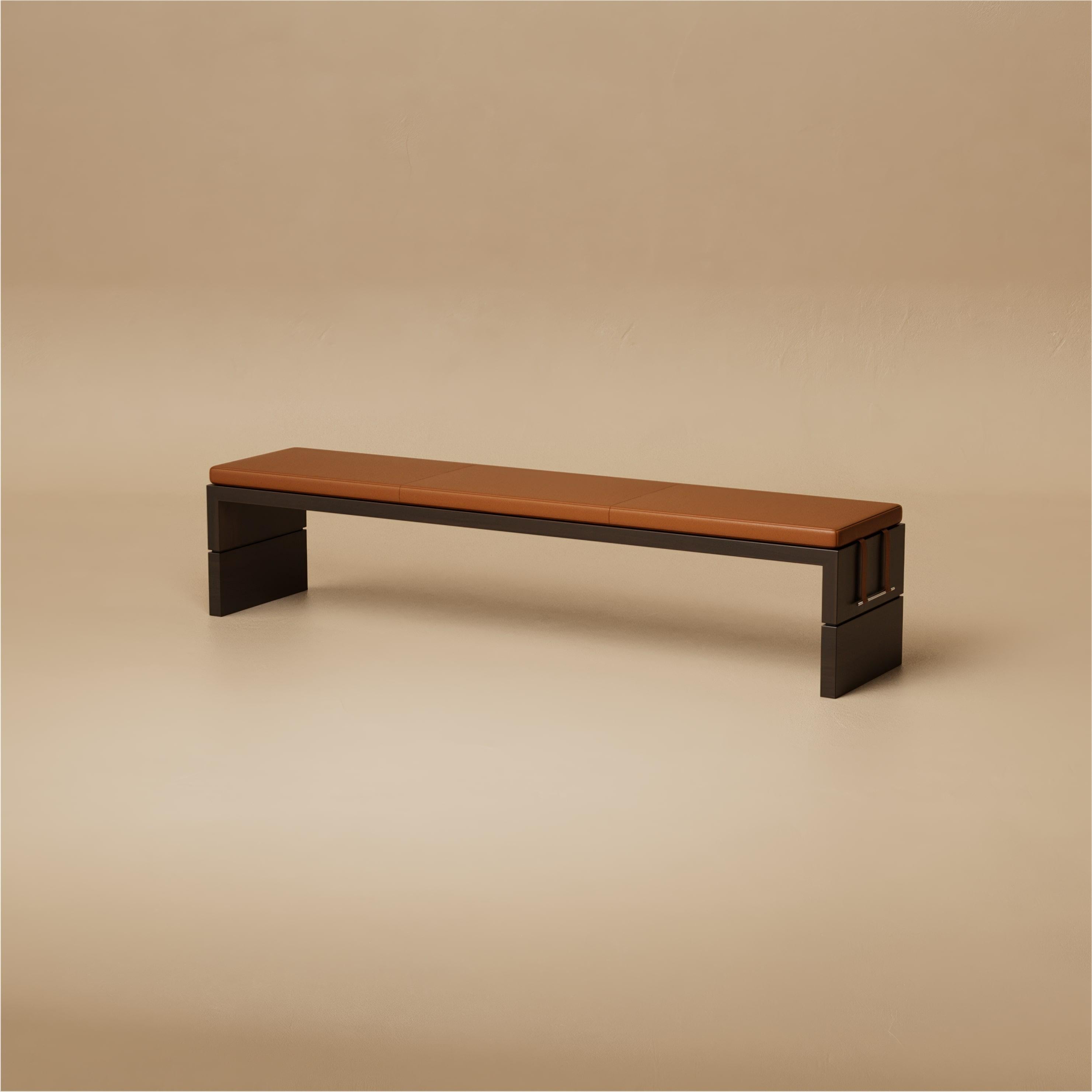 The Grant Bench is slim and architectural, designed as both a gesture of form and a place of rest. A walnut frame supports an upholstered seat, its proportions refined for use at the foot of a bed, in an entryway, or as a sculptural accent in open