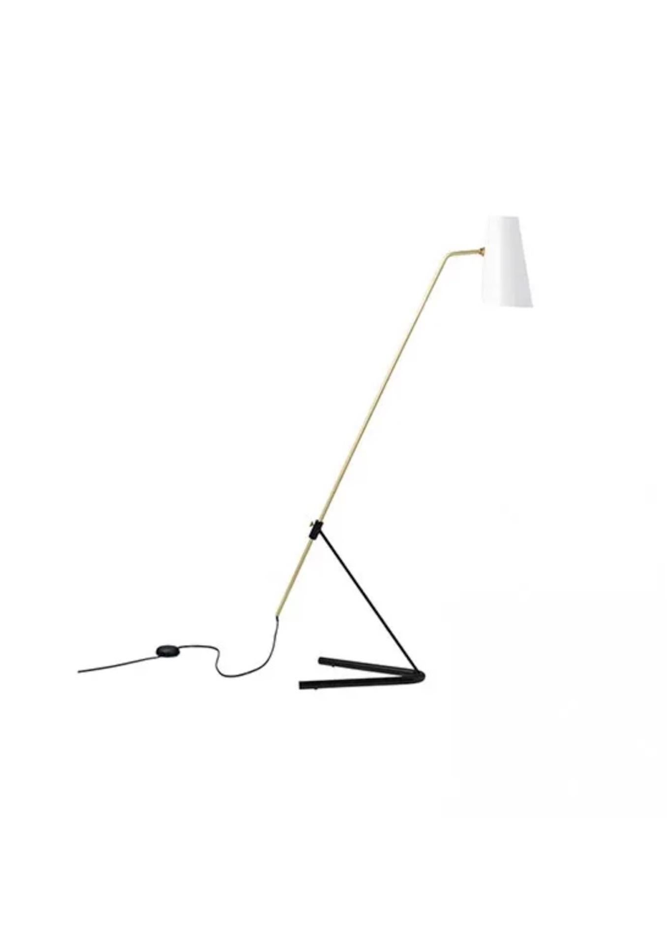 The G21 reading lamp is the perfect source of precise, intimate accent lighting. Available with a black/white or white/white lampshade and in a slightly perforated version, this model designed by Pierre Guariche in 1951 features a metal shade to