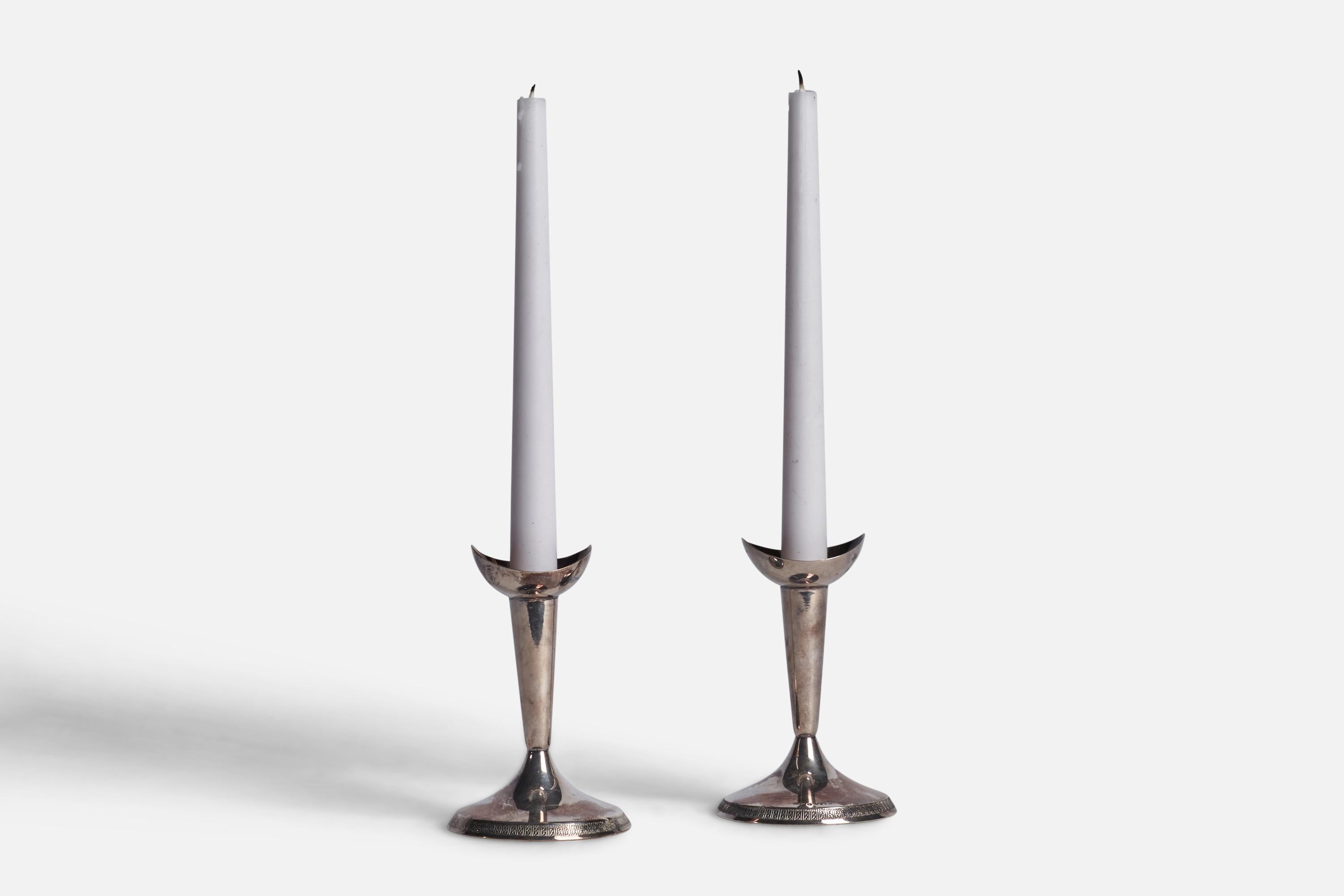 A pair of sterling silver candlesticks designed and produced by GAB Guldsmedsaktiebolaget, Sweden, 1930s.

fits 0.80” diameter candles