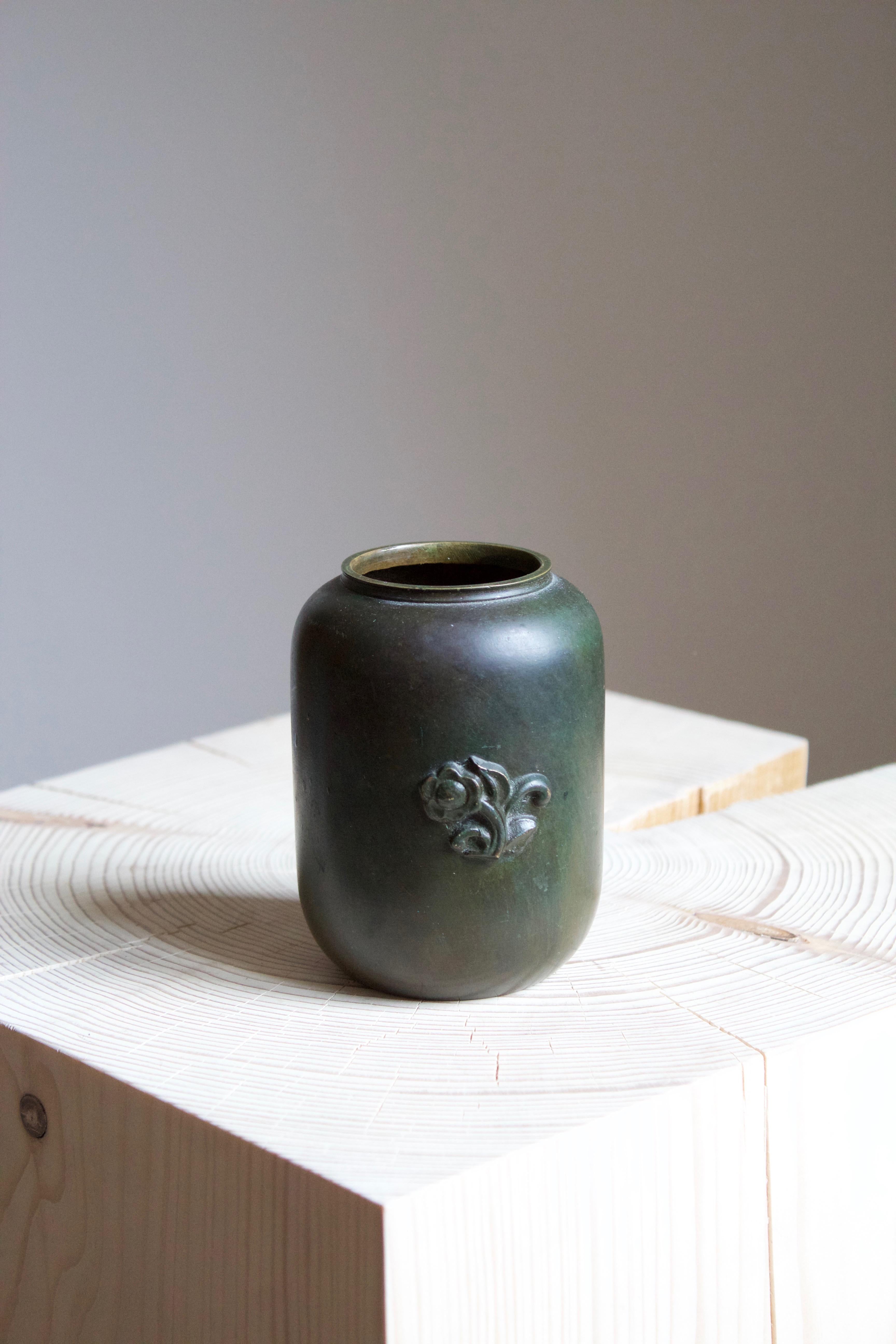 A small vase, designed and produced by GAB, stamped with makers mark, Sweden, 1930s. In cast bronze.

Other designers of the period include Josef Frank, Kaare Klint, Estrid Ericson, and Just Andersen.
  