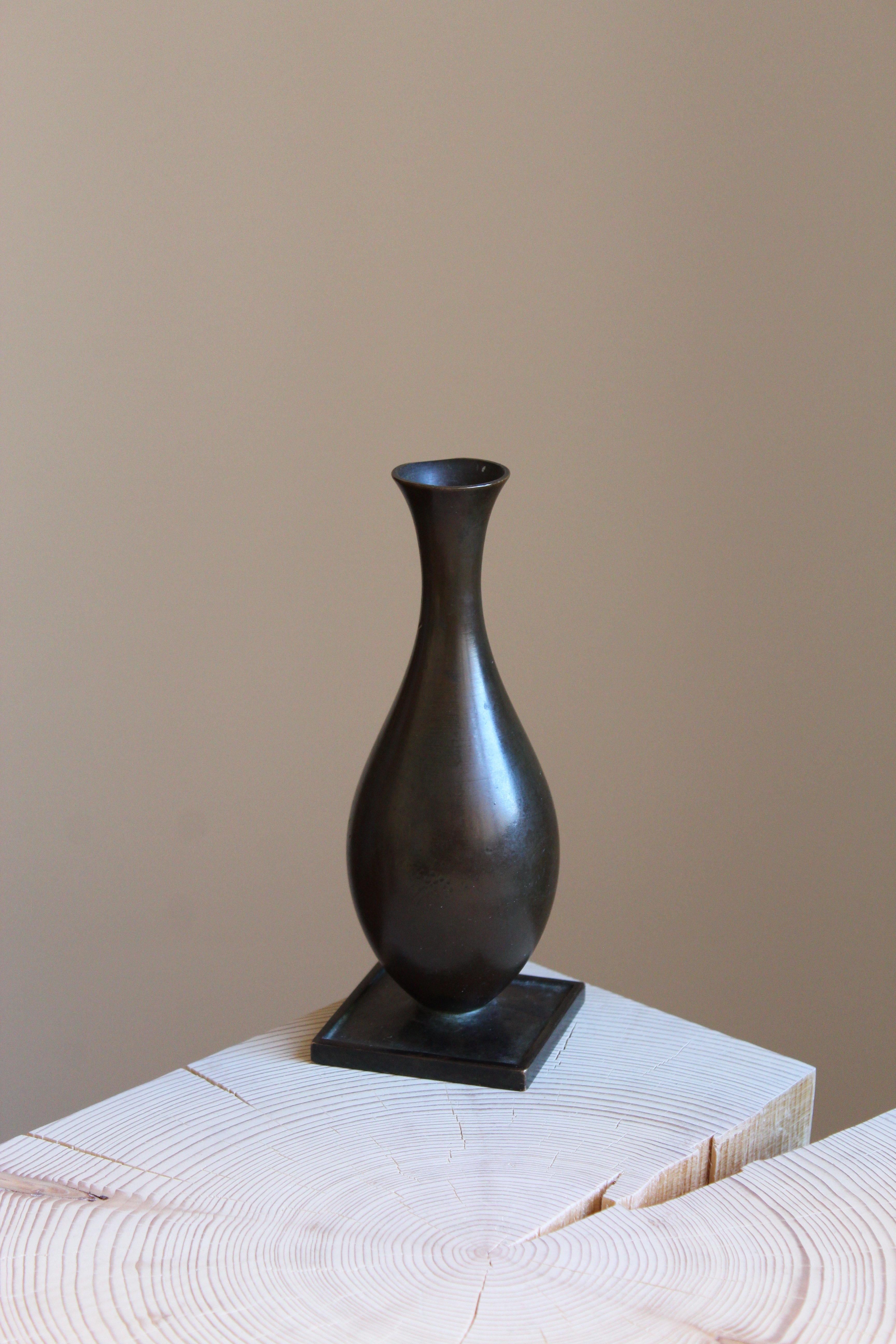 A vase or vessel, designed and produced by GAB, stamped with makers mark, Sweden, 1930s. In cast bronze.

Other designers of the period include Josef Frank, Kaare Klint, Estrid Ericson, and Just Andersen.
  