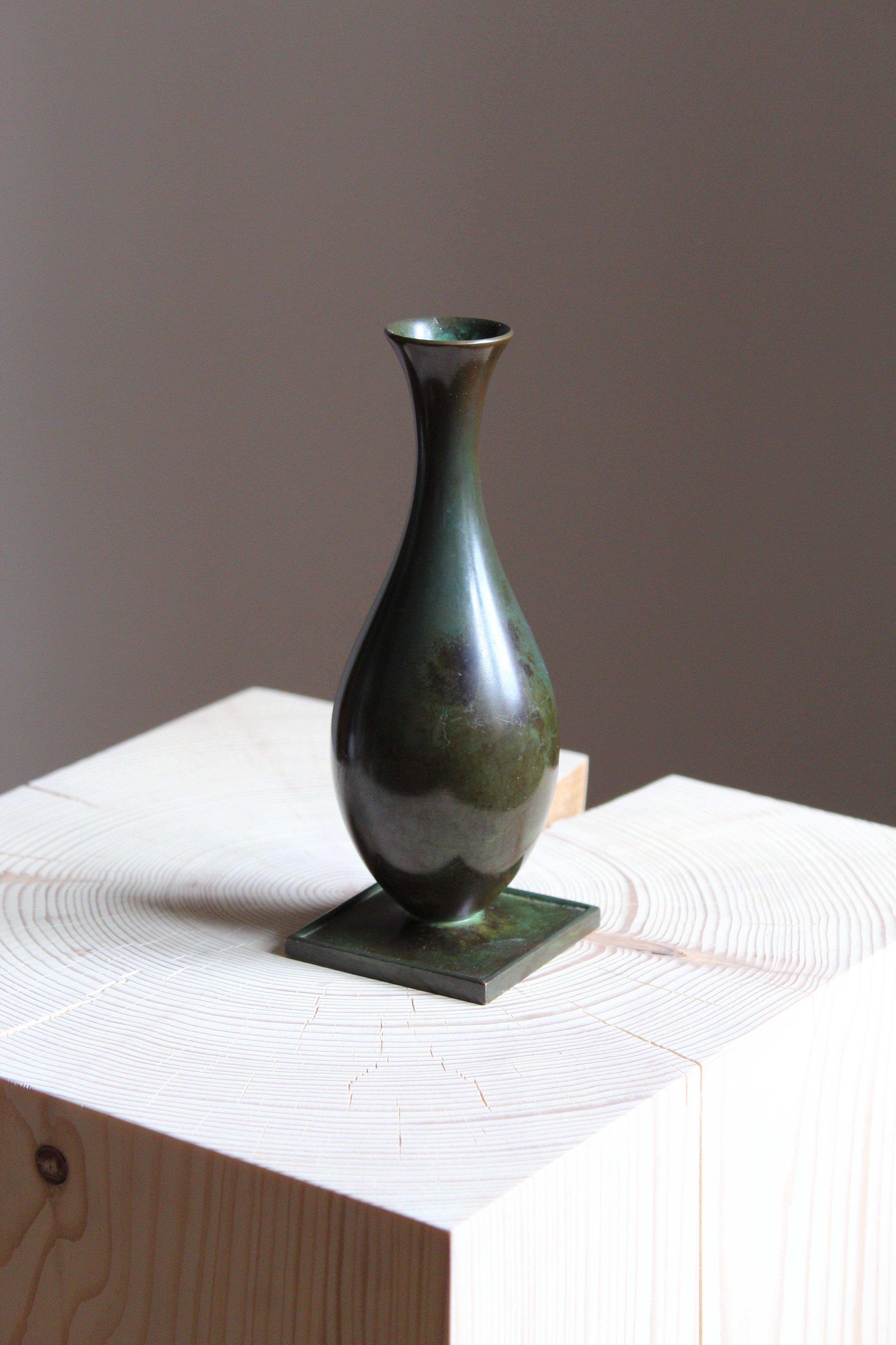 A vase or vessel, designed and produced by GAB, stamped with makers mark, Sweden, 1930s. In cast bronze.

Other designers of the period include Josef Frank, Kaare Klint, Estrid Ericson, and Just Andersen.
 