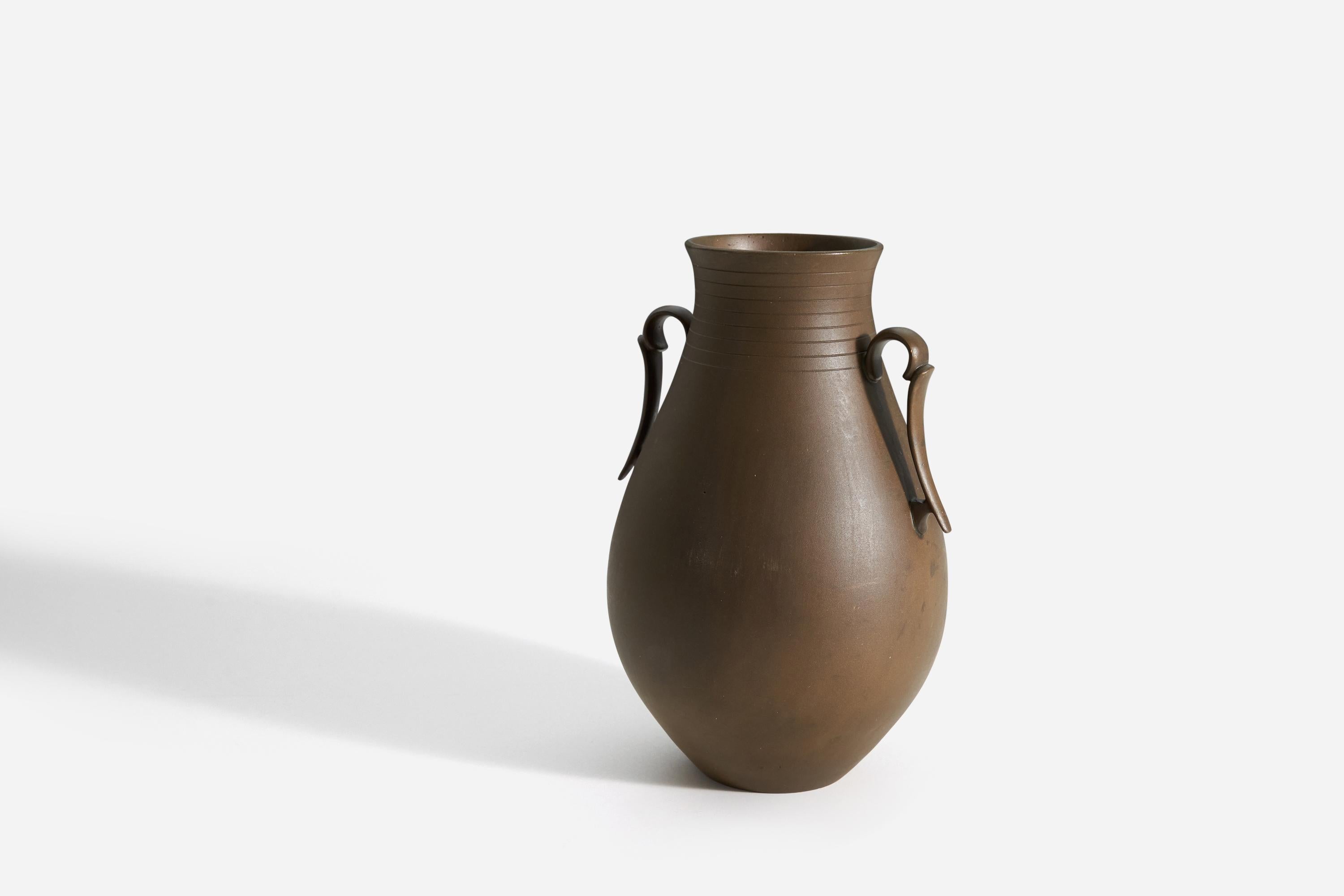 A cast bronze vase produced by GAB, Sweden, c. 1930s. 


