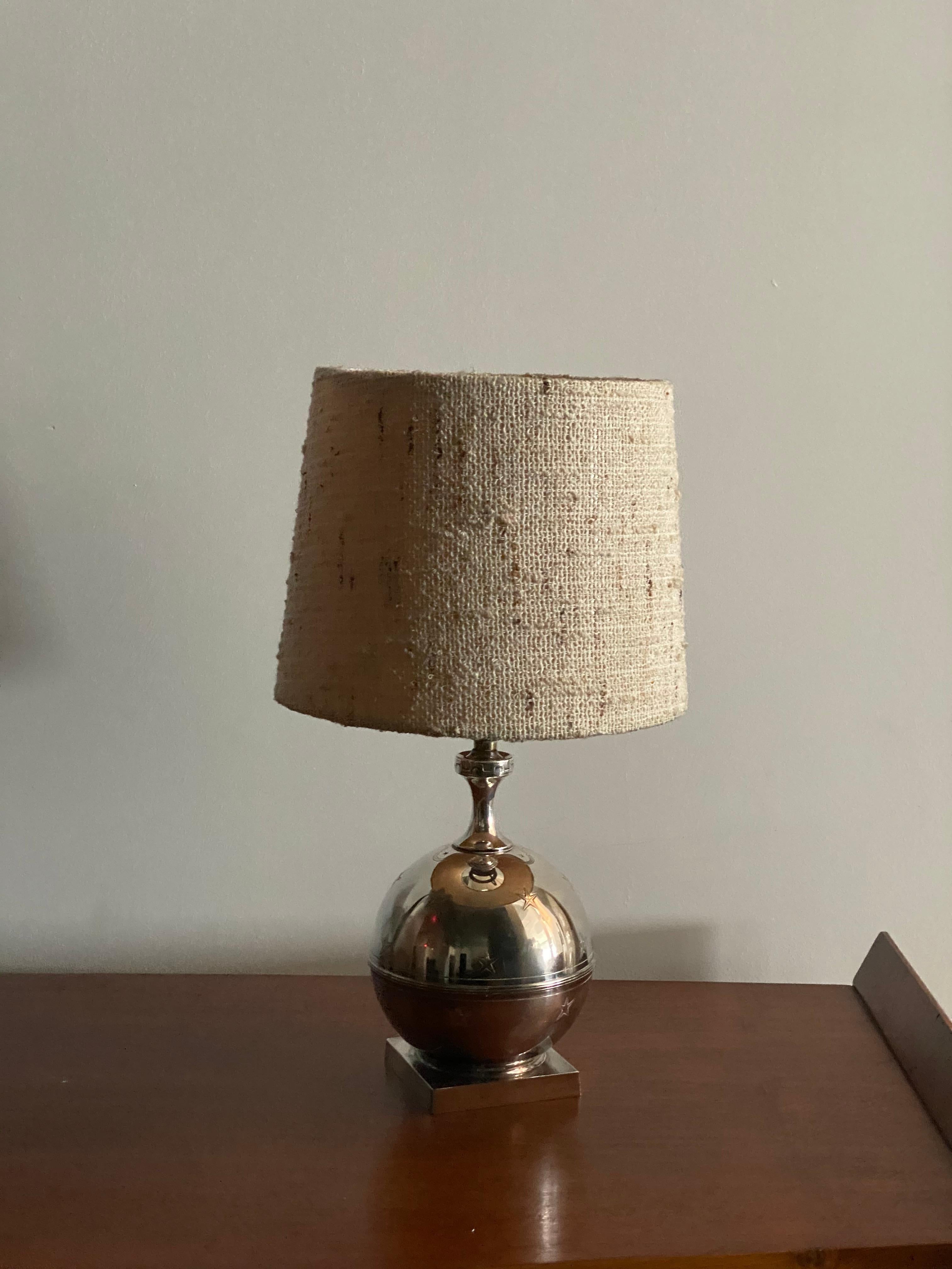 A table lamp by GAB. Executed in finely ornamented pewter, stamped with makers mark, Sweden, 1930s.

GAB is short for Guldsmedsaktiebolaget, which translates roughly to 