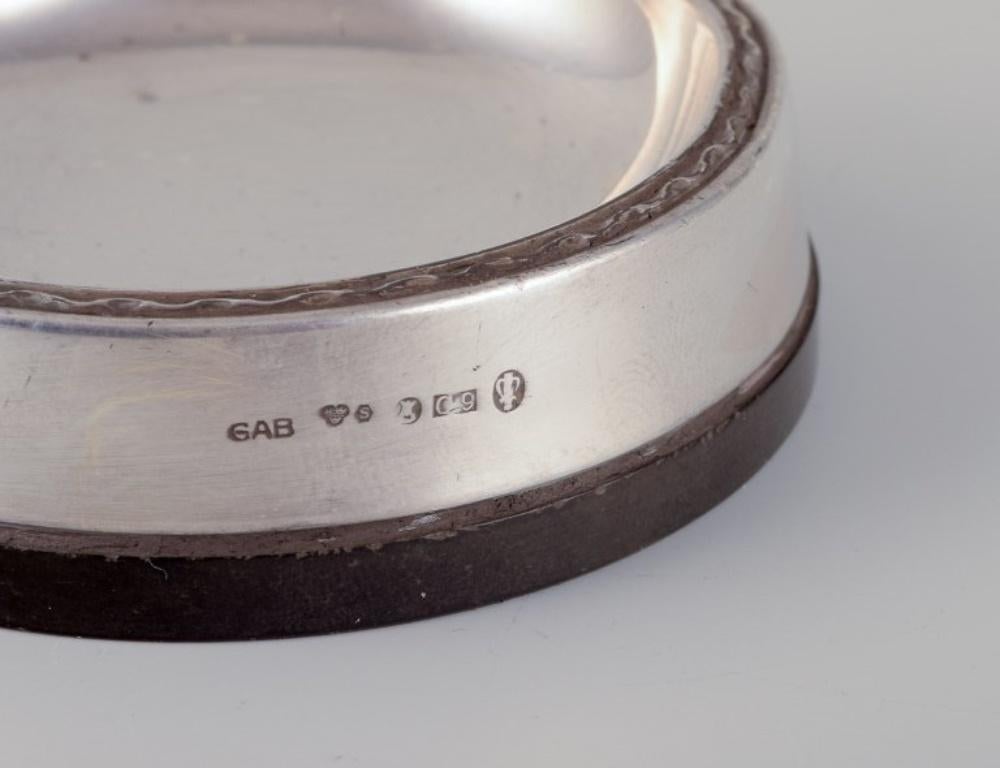 Silver GAB, Sweden. Four salt cellars in 830 silver and bakelite. Art Deco style. For Sale
