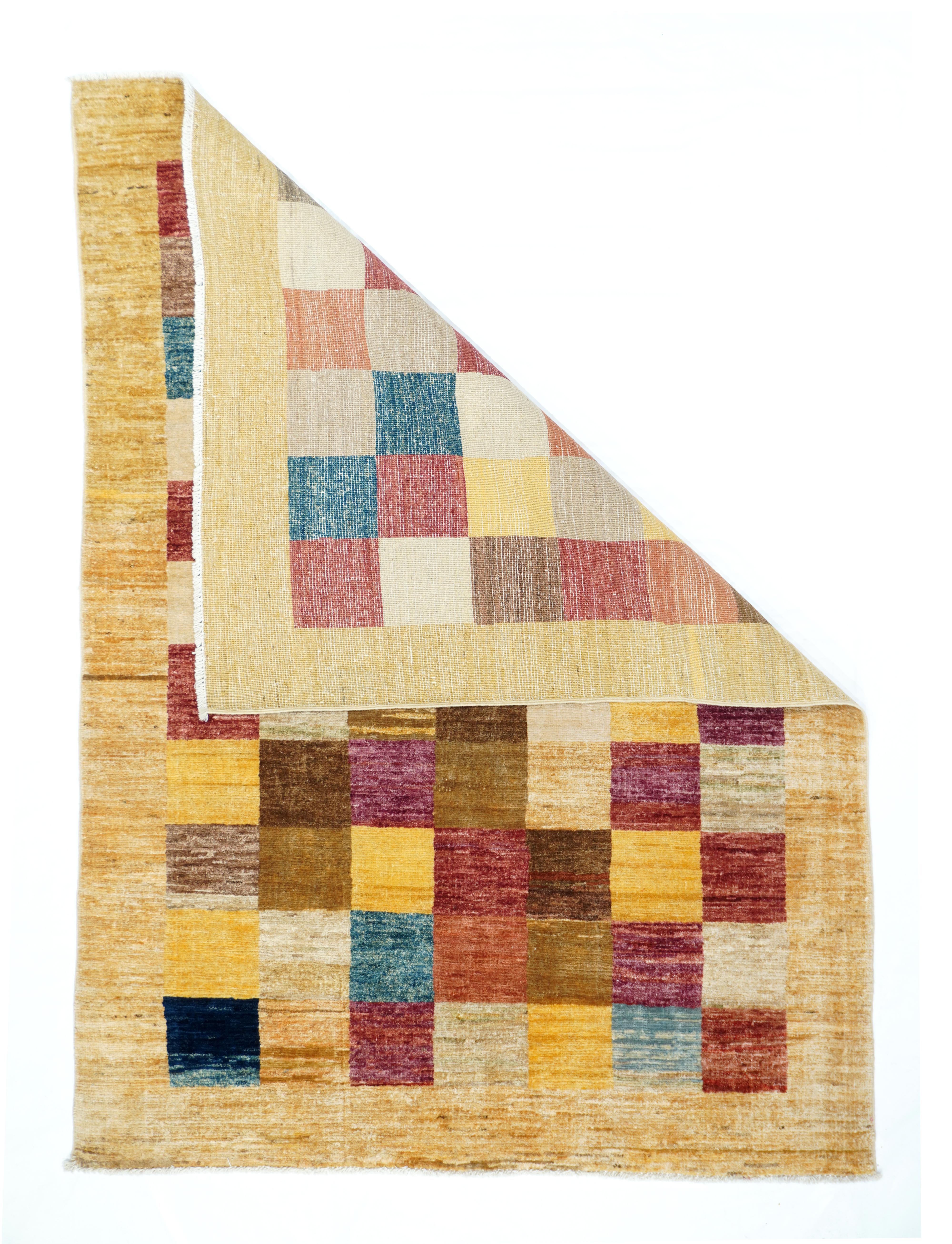 Gabbeh Rug 4' x 5'10''. This multicolor chessboard squares carpet shows plain, abrashed reserves in rust, red, navy, blue, deep straw, and beige, within an equally plain border. Random color placement, so no order is developed. Better that way,