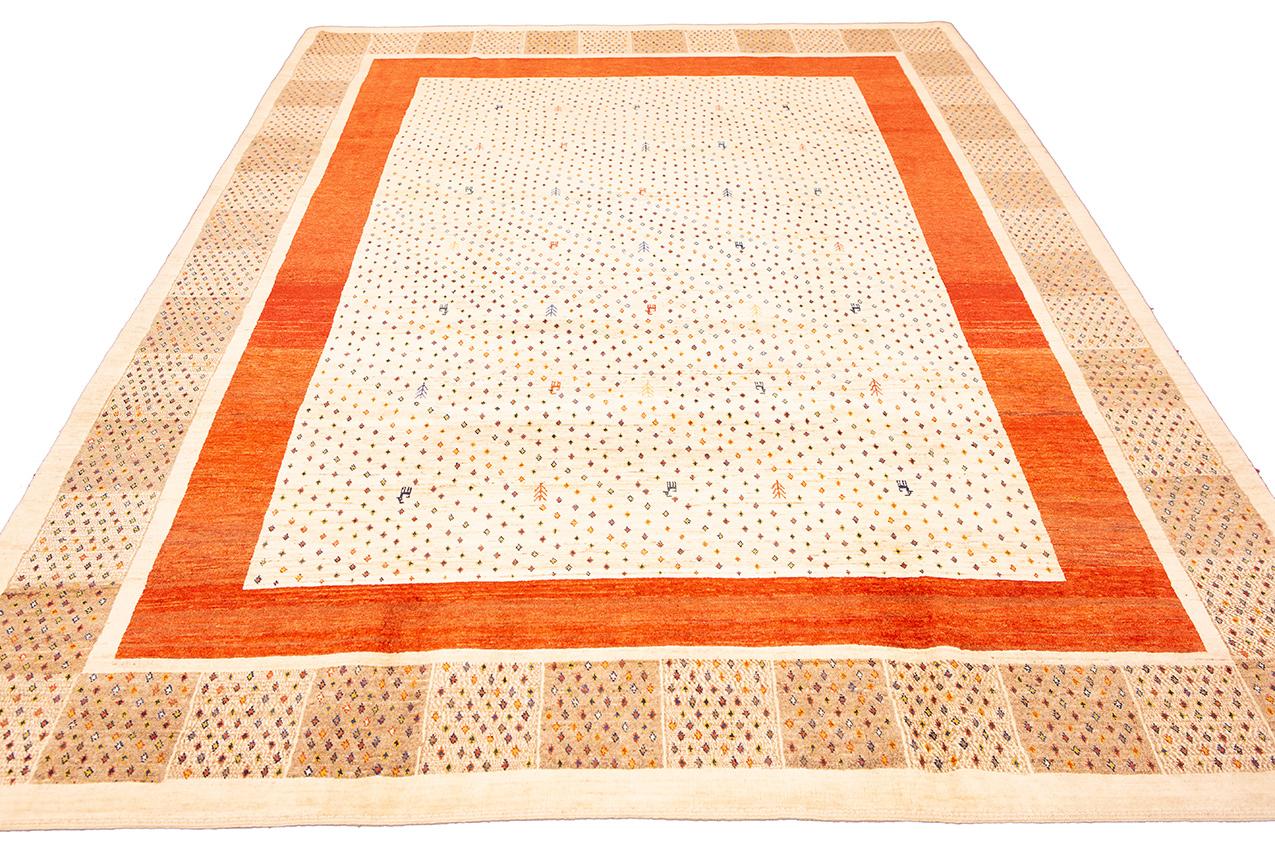 Tan France Auction Pick

This magnificent Gabbeh style Carpet is truly a work of art. The minimal design of this piece is perfect for adding a touch of luxury to any room. This carpet is hand-woven from the finest quality wool, making it extremely