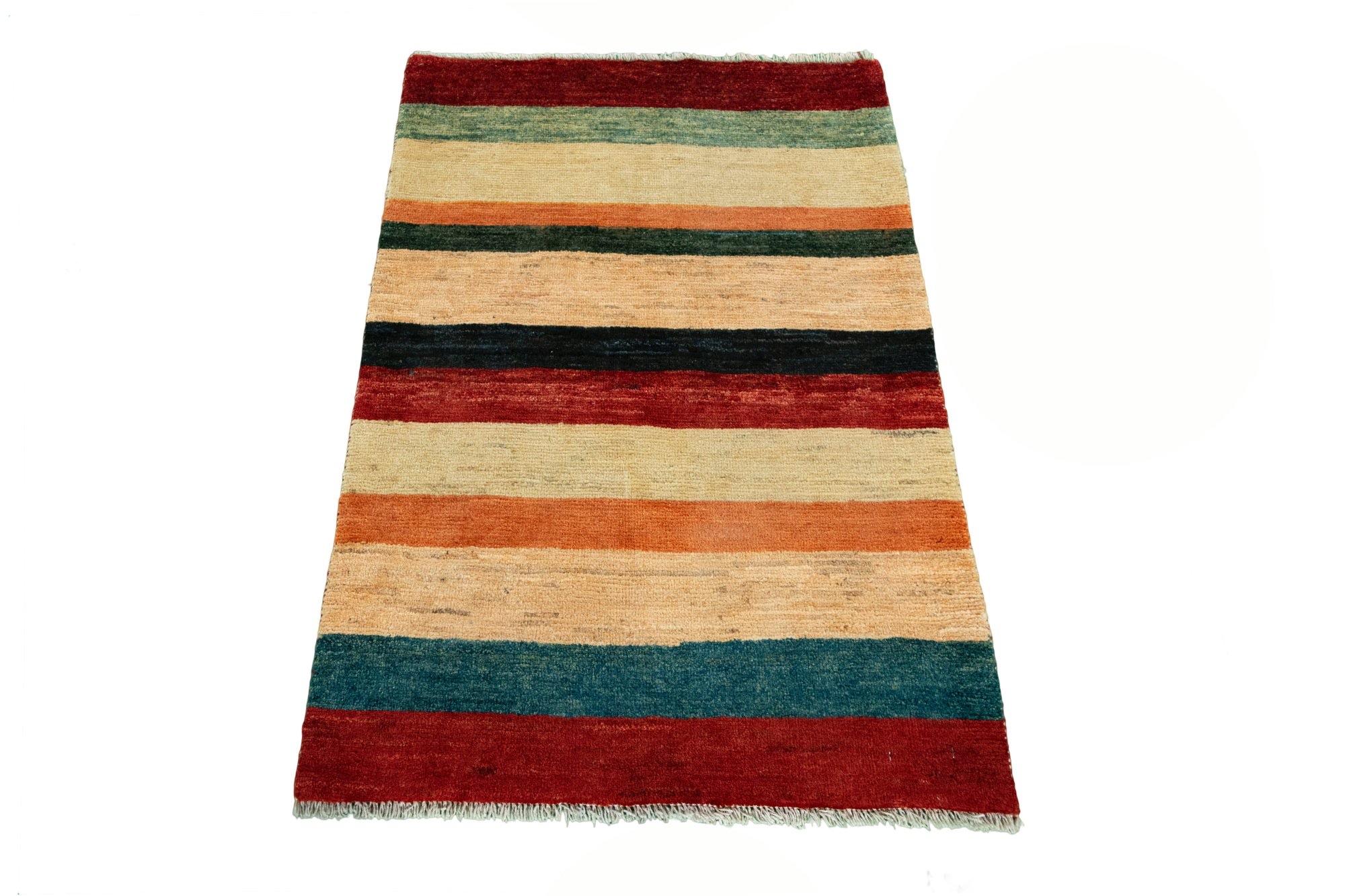 Gabbeh Persian Nomad Rug

Gabbeh rugs are often simply patterned and not particularly detailed.
However, these are the most famous nomadic carpets of Iran. Gabbeh carpets are knotted by the nomads of the Ghashghai tribe in the province of Fars in