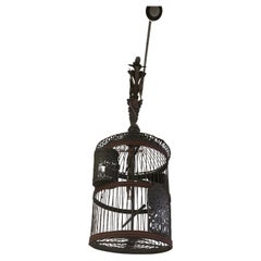 Lombard cage with attached arm made of iron and sheet metal