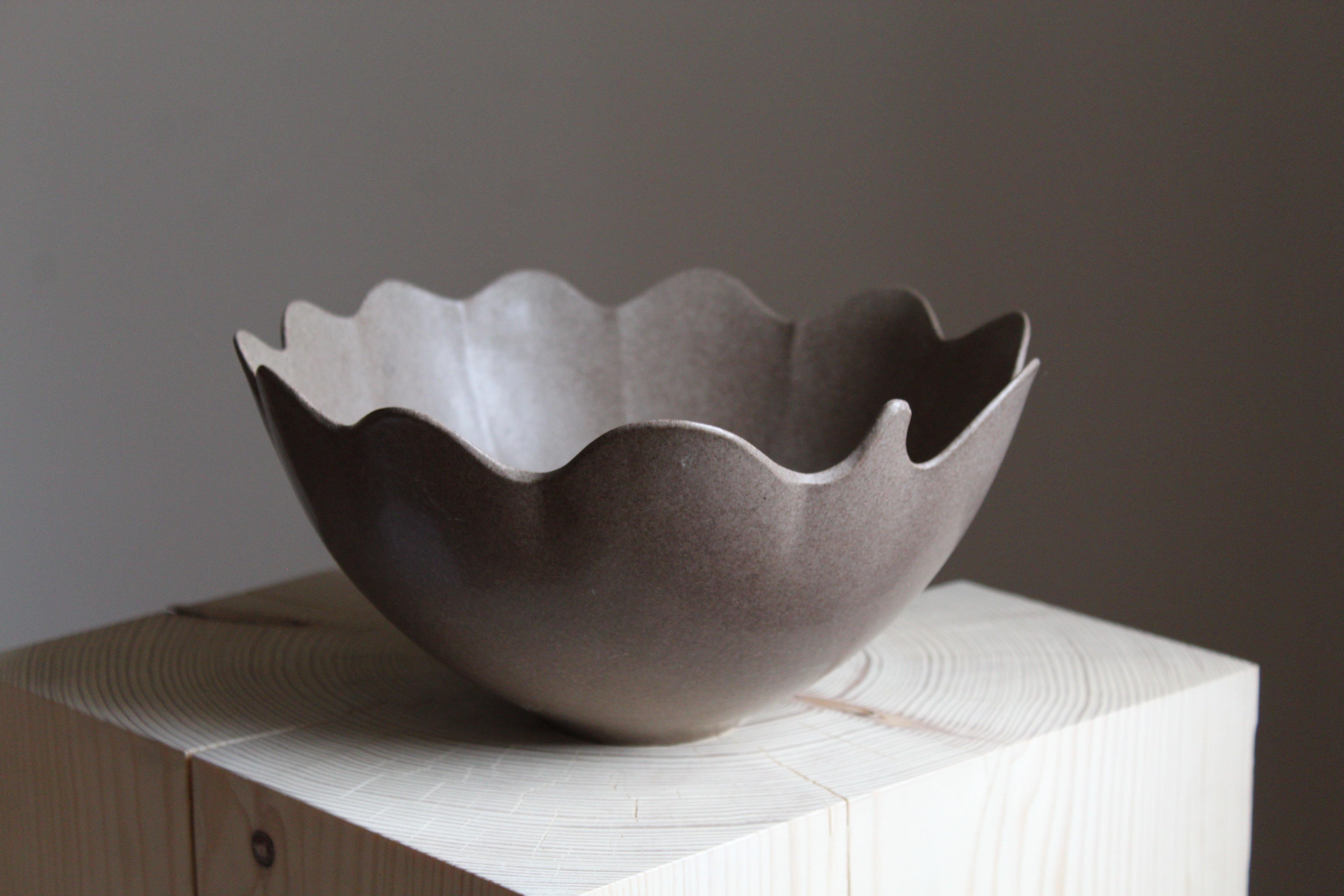 An organically shaped stoneware bowl by Gabi Citron Tengborg for the iconic Swedish firm Gustavsberg. 

Other ceramicists of the period include Berndt Friberg, Axel Salto, Carl-Harry Stålhane and Wilhelm Kåge.
