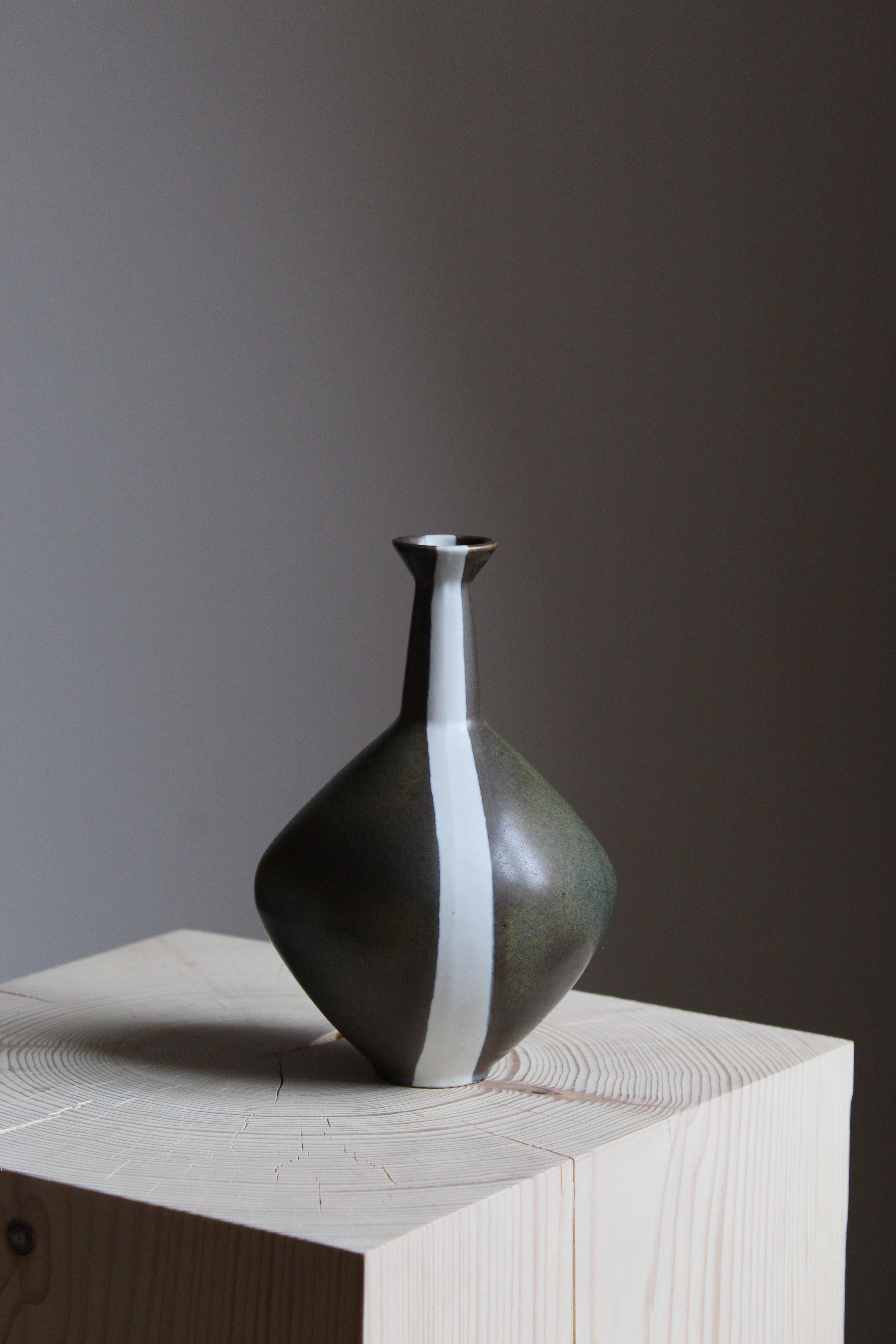 An organically shaped stoneware vase by Gabi Citron Tengborg for the iconic Swedish firm Gustavsberg. 

Other ceramicists of the period include Berndt Friberg, Axel Salto, Carl-Harry Stålhane and Wilhelm Kåge.