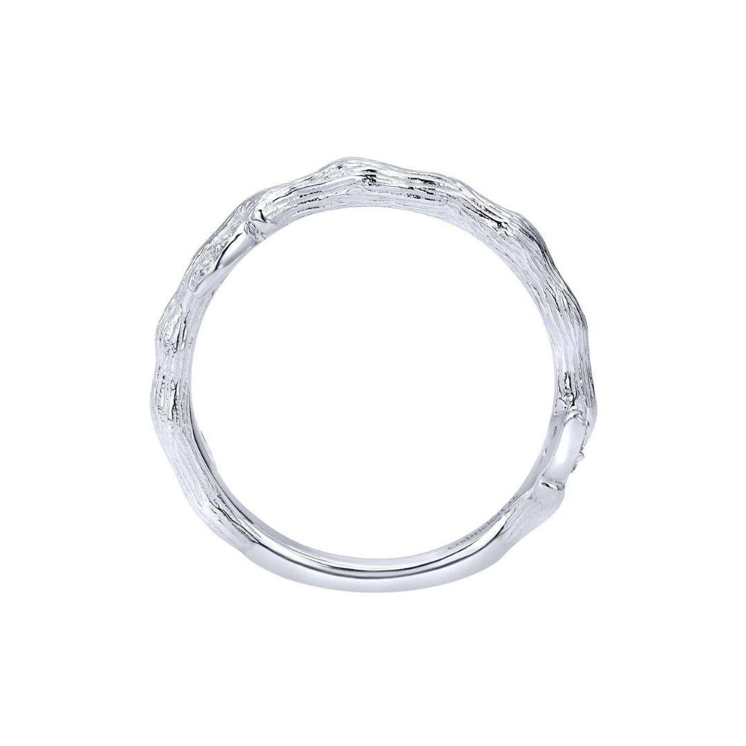 Contemporary organic design in 14k white gold with encrusted diamonds. Suitable for a fashion ring, stackable, or as a unique wedding band. Total diamond weight 0.07 ctw, H color, Si clarity.
