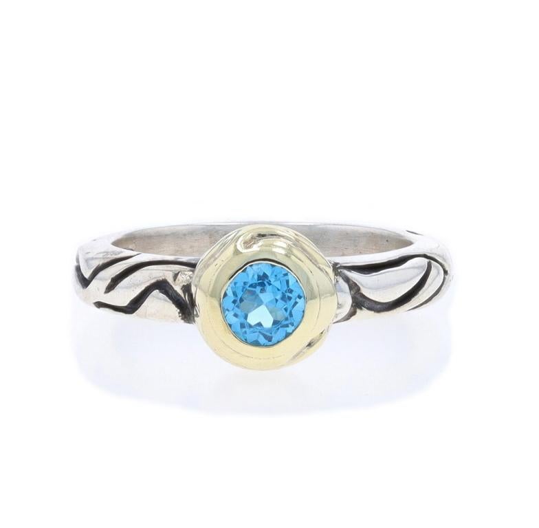 Size: 7 1/2
Sizing Fee: Up 1 1/2 sizes for $35 or Down 1 size for $35

Brand: Gabriel

Metal Content: Sterling Silver & 14k Yellow Gold

Stone Information

Natural Blue Topaz
Treatment: Routinely Enhanced
Cut: Round

Style: Solitaire
Features: