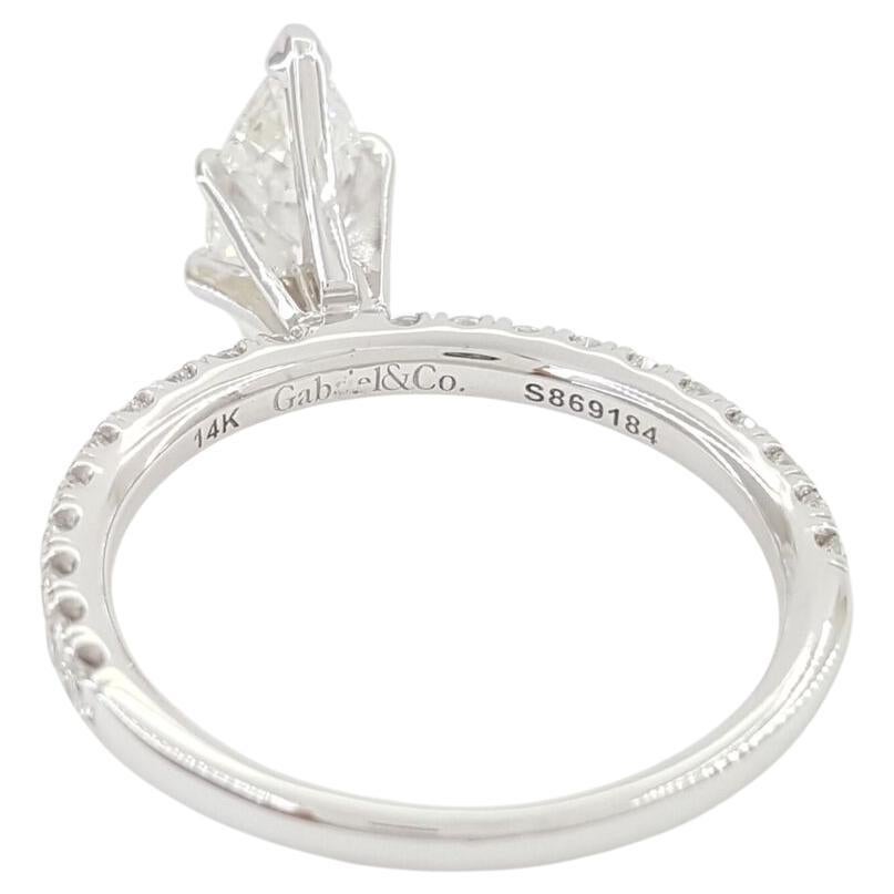 Gabriel & Co. 1.53 ct Marquise Brilliant Cut Diamond Engagement Ring in 14k White Gold. 

The ring weighs 3 grams, size 7.5, 13.4mm wide, 9.2mm high, the center is a 1.13 ct Natural Marquise Brilliant Cut Diamond, G in color, SI1 in Clarity, Good