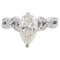 Gabriel 
Co. 1.55 Carat Pear-Shaped Diamond Crossover Engagement Ring in 14K