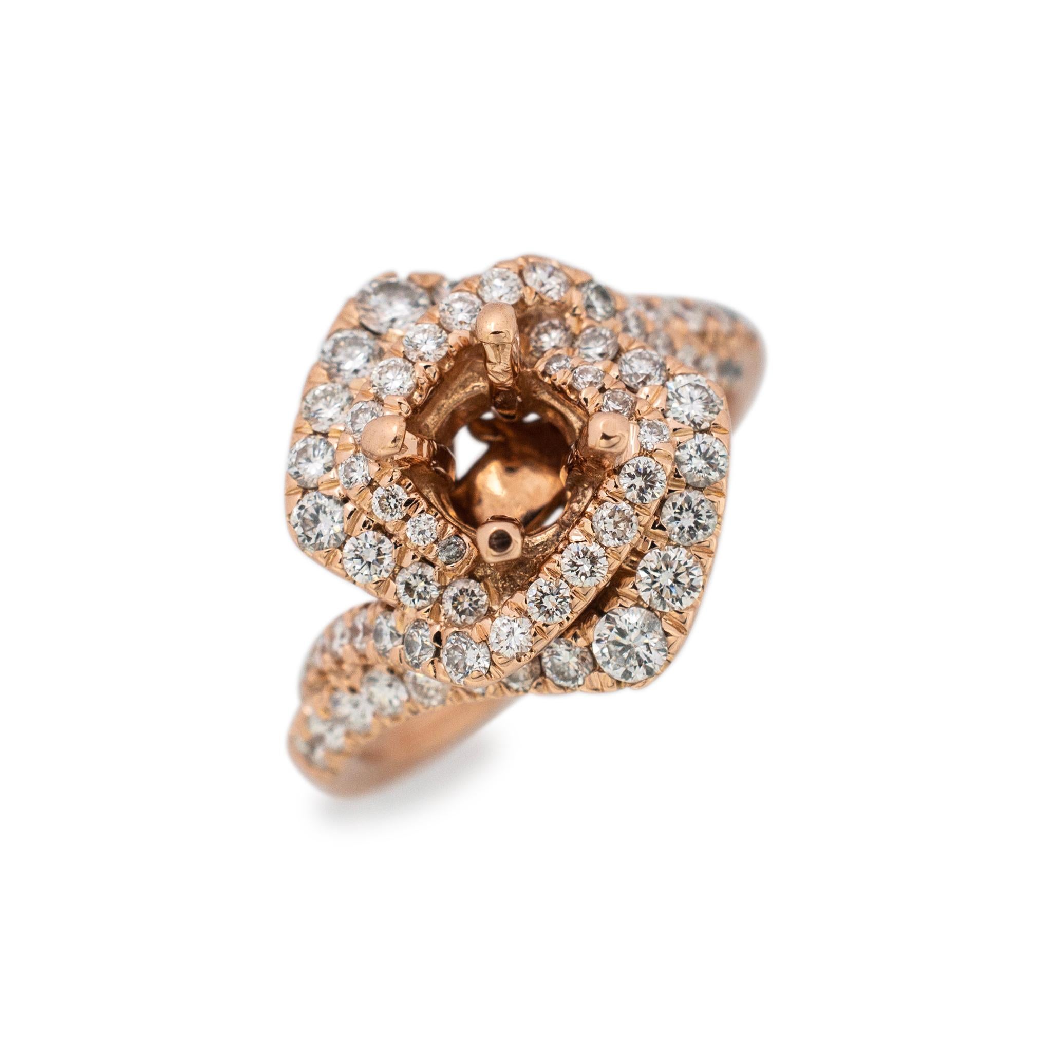 Brand: Gabriel & Co.

Gender: Ladies

Metal Type: 14K Rose Gold

Size: 6.5

Shank Maximum Width: 2.30 mm

Head Measurement: 16.00mm x 14.00mm

Weight: 6.60 grams

Ladies 14K rose gold diamond double-halo bypass ring with a half round shank. Engraved