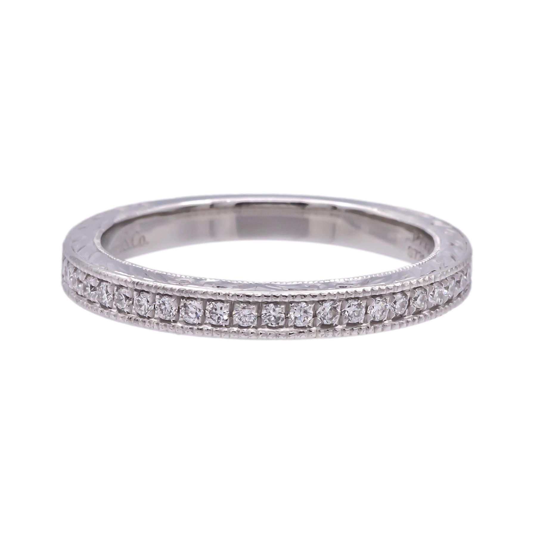 This Gabriel & Co. diamond band from the Victorian collection, is crafted in platinum (PT950), and features 23 round brilliant-cut diamonds with a total weight of 0.23 carats, graded G color and VS clarity. The diamonds are set in a