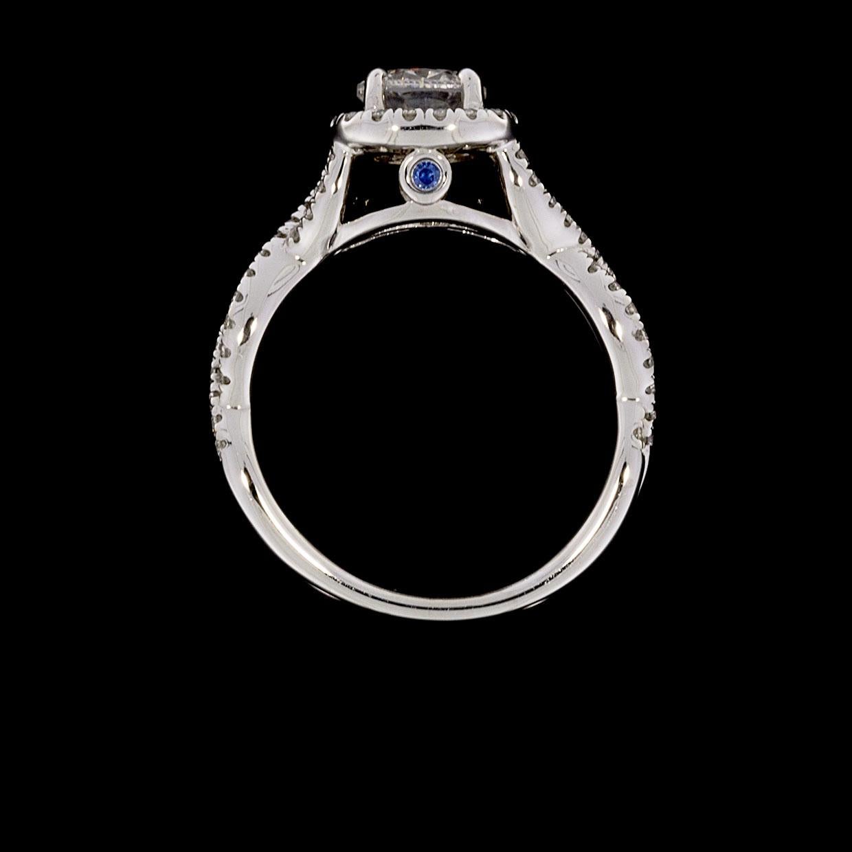 Gabriel & Co. White Gold Round Diamond Halo Twist Engagement Ring In New Condition In Columbia, MO