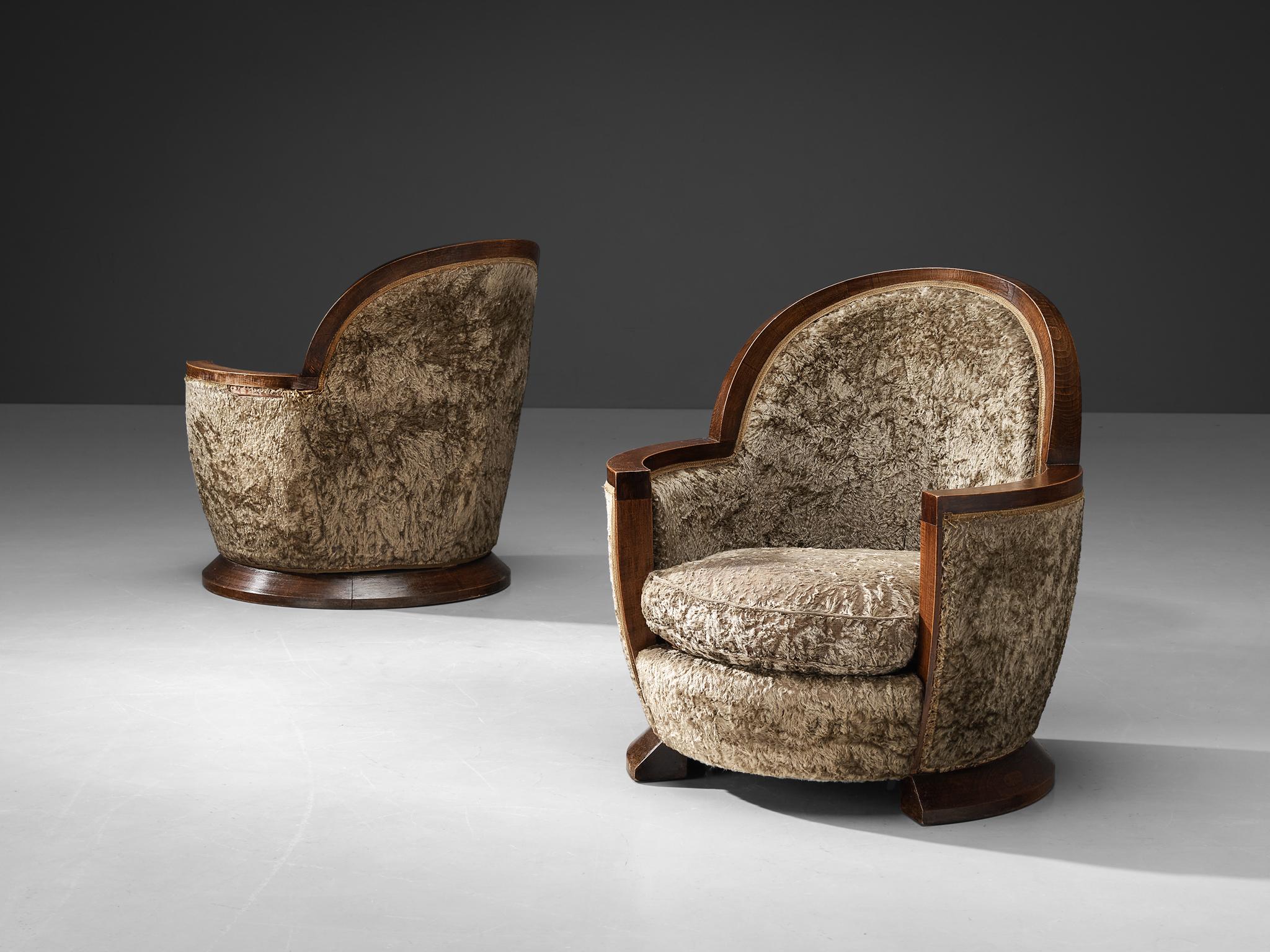 Gabriel Englinger, lounge chairs, wood, long pile velvet upholstery, France, 1928.

Rare pair of Art Deco armchairs designed by Gabriel Englinger in 1928. These chairs are upholstered in a taupe colored long pile velvet fabric which complements the