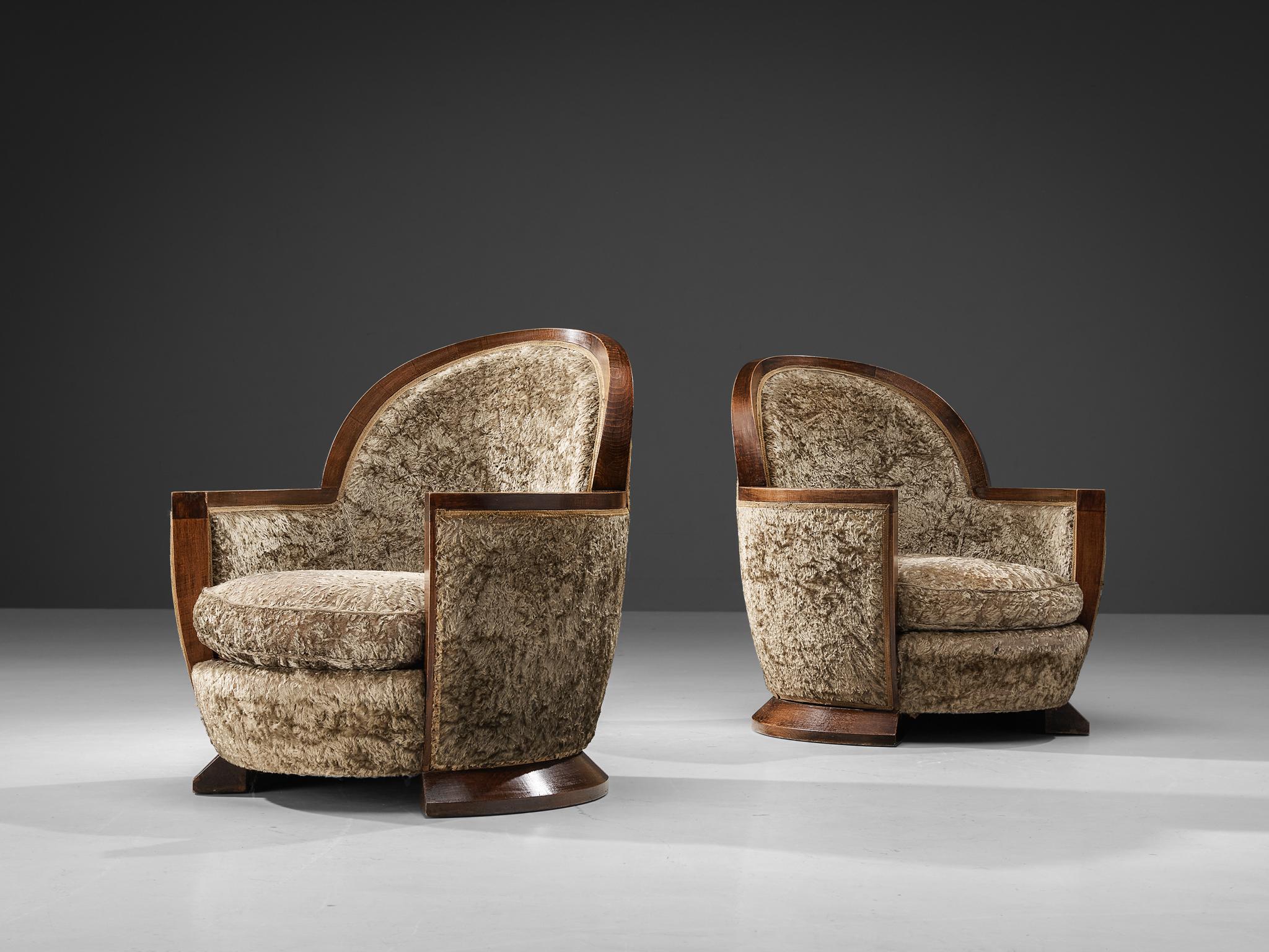 Gabriel Englinger, lounge chairs, wood, long pile velvet upholstery, France, 1928.

Rare pair of Art Deco armchairs designed by Gabriel Englinger in 1928. These chairs are upholstered in a taupe colored long pile velvet fabric which complements the