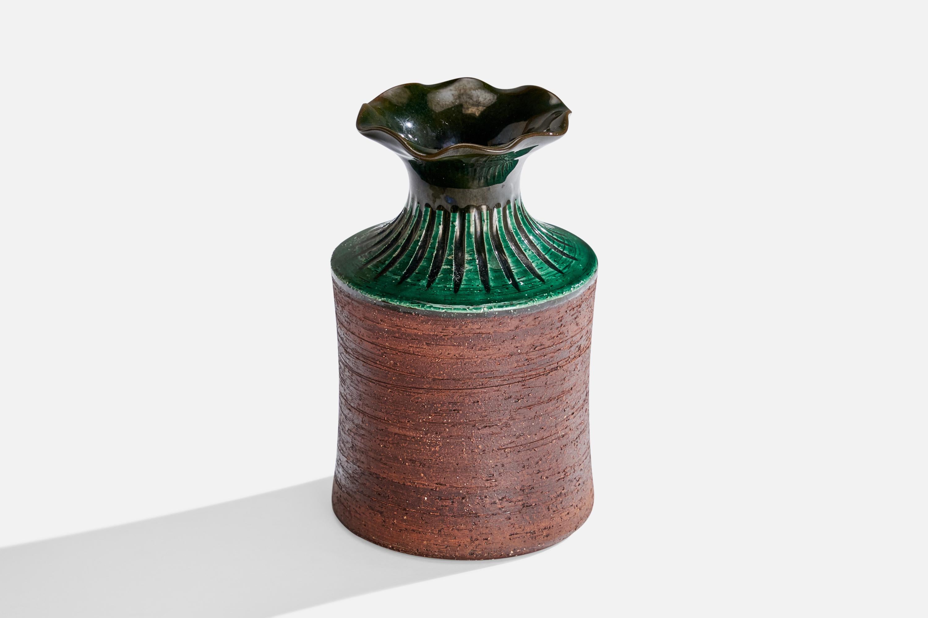 A green and brown-glazed earthenware vase designed and produced by Gabriel Keramik, Sweden, c. 1950s.