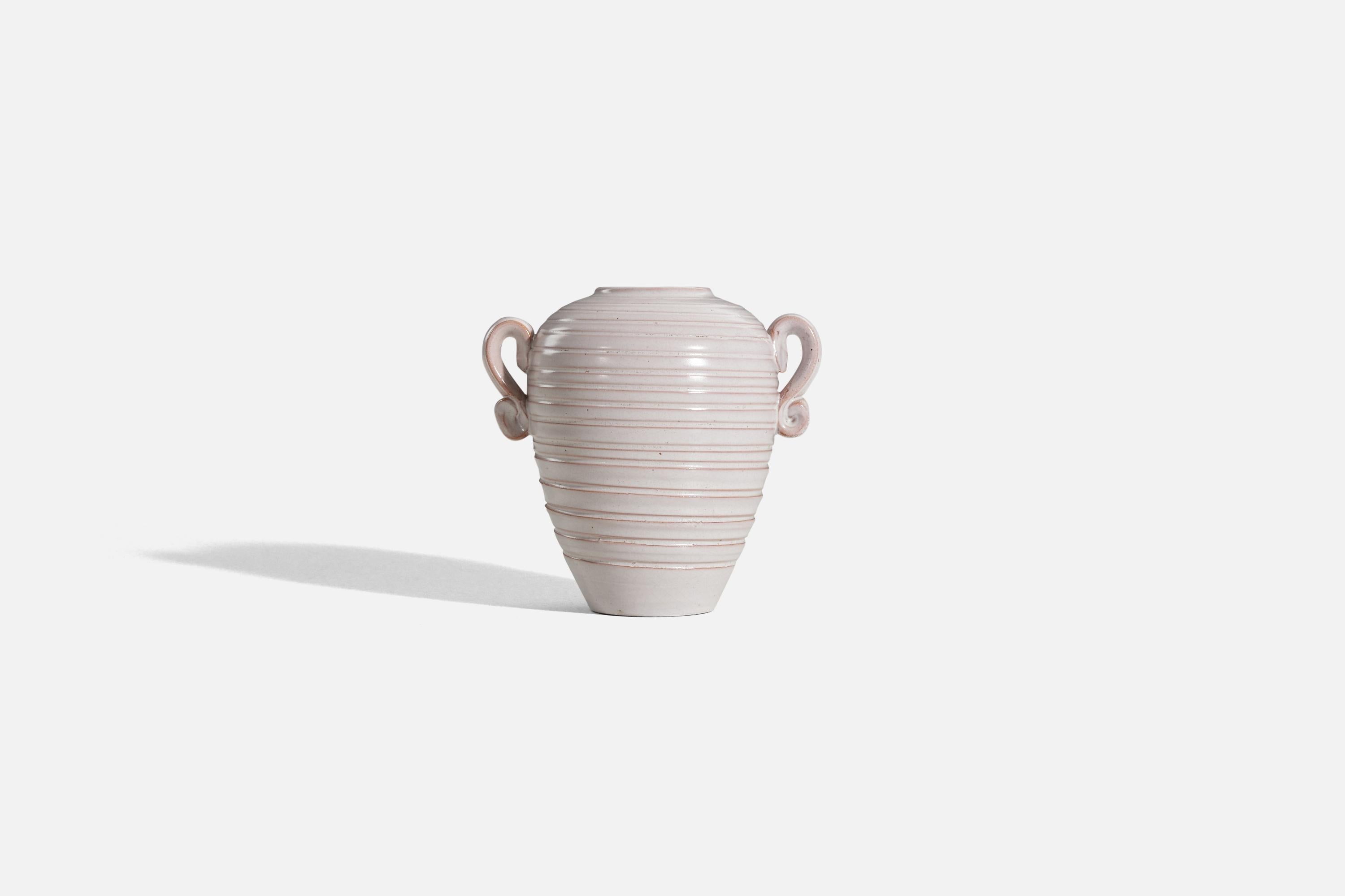 A white and pink-glazed earthenware vase designed and produced by Gabriel Keramik, Sweden, c. 1930s.