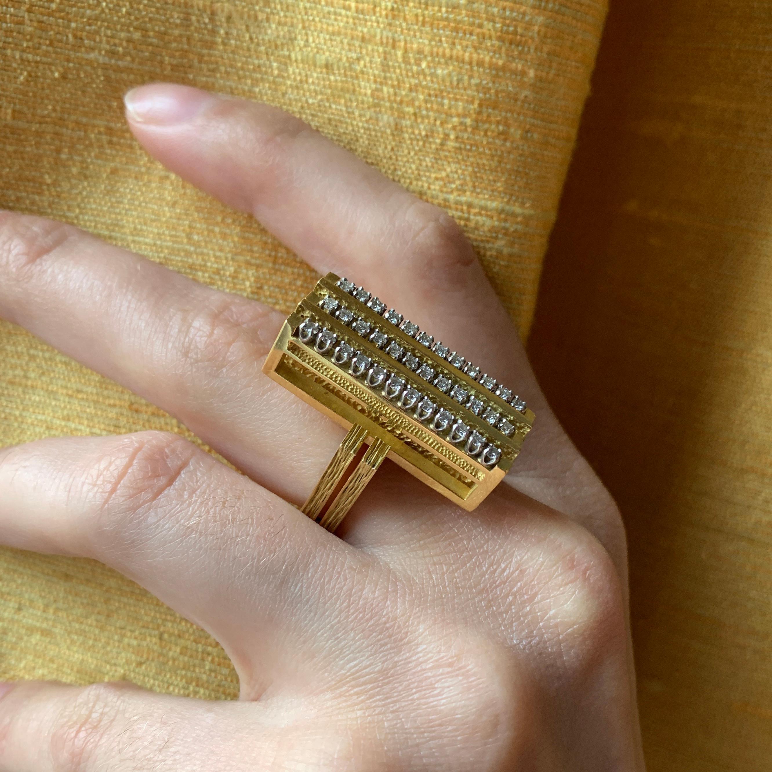 A diamond and 18 karat yellow gold ring, by the late Montreal jeweler, Gabriel Lucas, one of Canada's finest, who also made designs for Cartier. The ring is a size 7.25 and it measures 1.2
