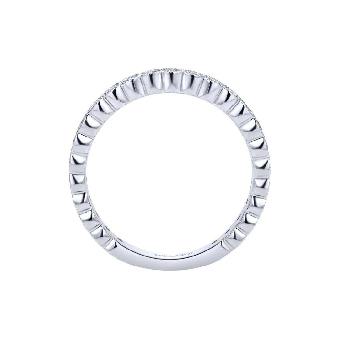 Milgrain bezels flow into each other creating a one of a kind fusion of antique flair and a modern touch. Band contains 0.47 ctw of fine white round diamonds, H color, SI clarity. Band is suitable as a fashion ring, anniversary ring, a wedding band