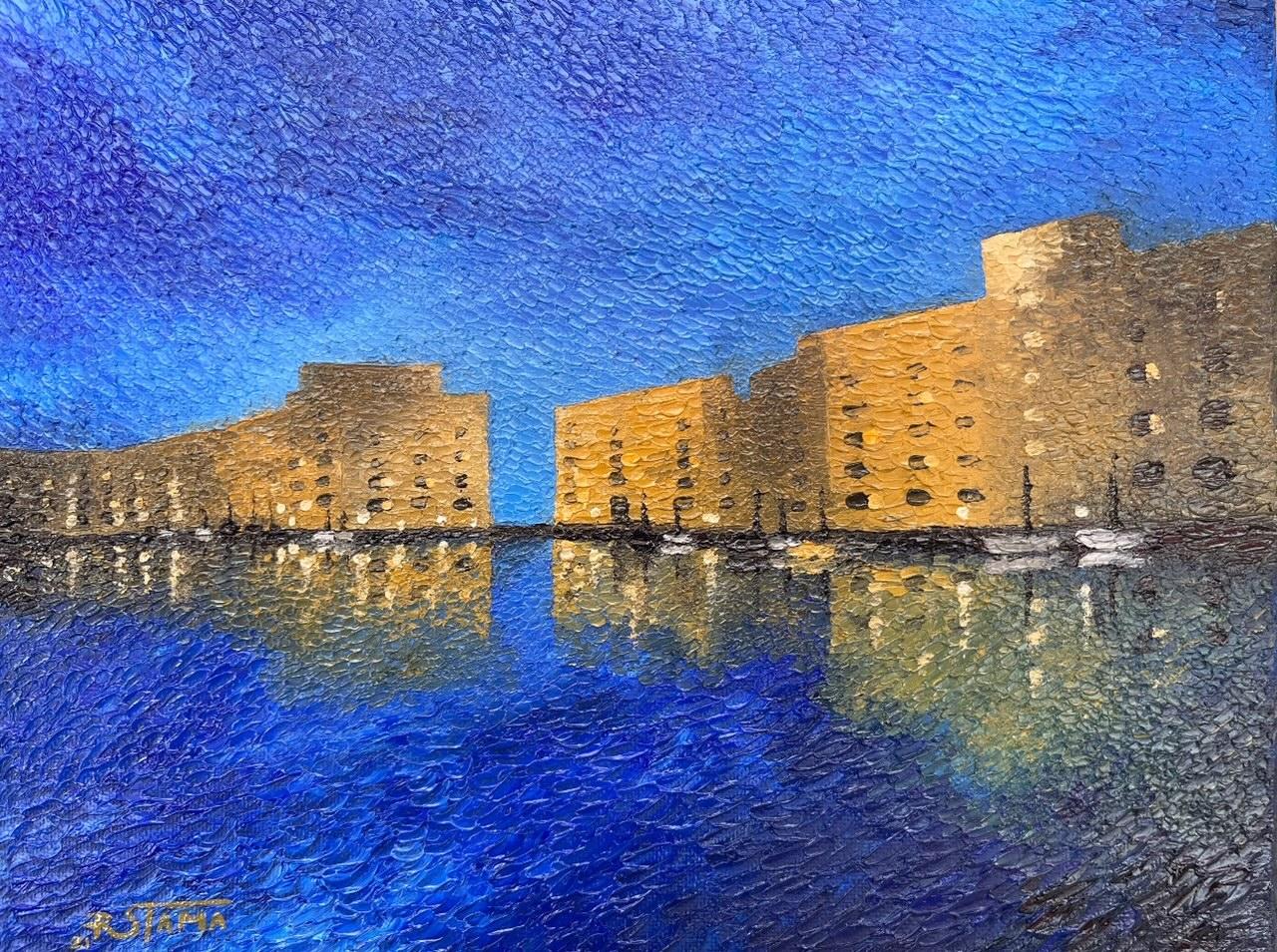 Let the moonlit magic of Malaga captivate you through this enchanting Petrino style oil painting.The textured canvas boasts a myriad of blue shades that echo the serene Mediterranean nights, while the golden hues of the buildings lights outline a