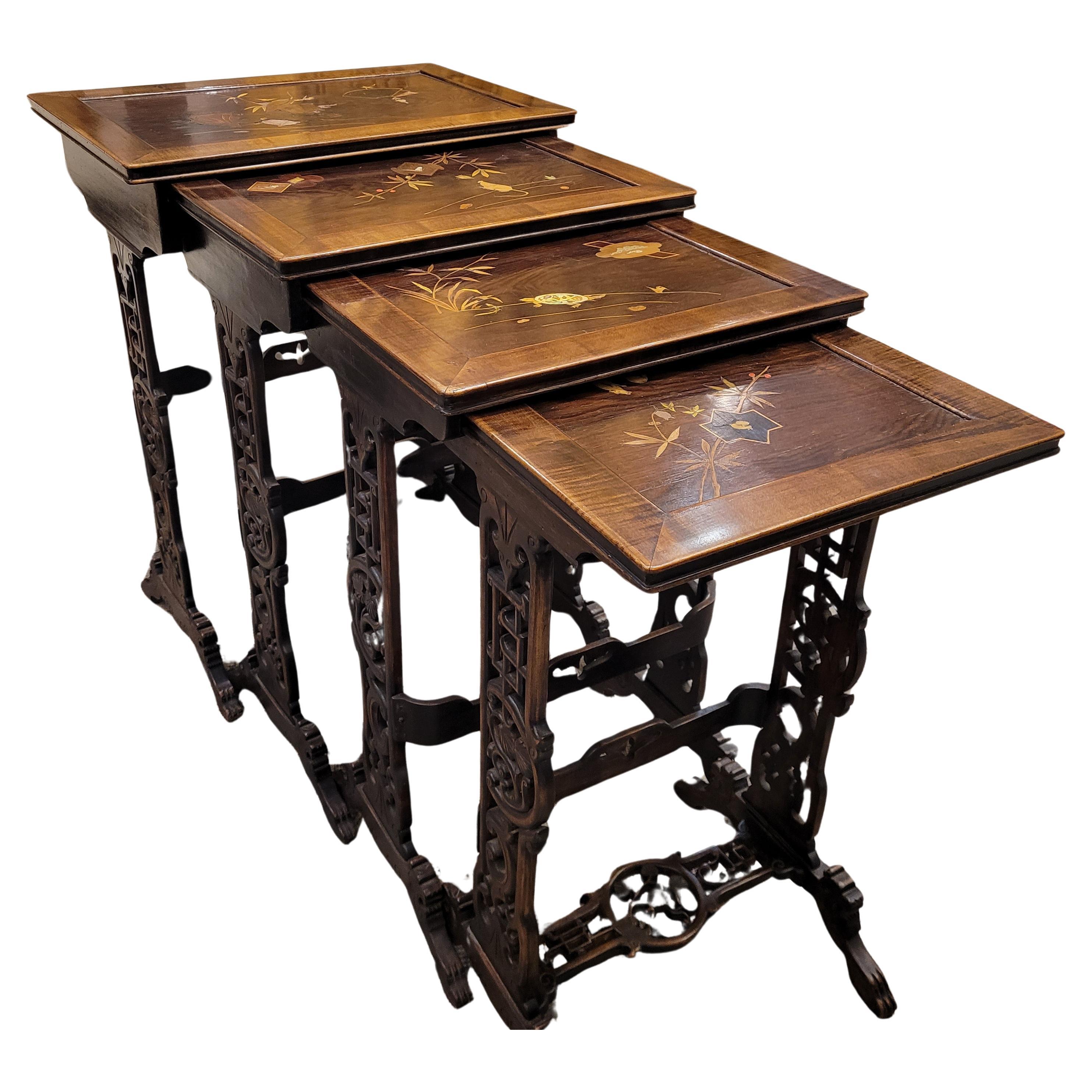 Extraordinary and one of a kind set of nesting tables with decoration following late 19th century Japanese style, attributed to the renowned  French artist Gabriel-Frédéric Viardot (1830 - 1906).
The tables have decorations of turtles, rats, bonsais