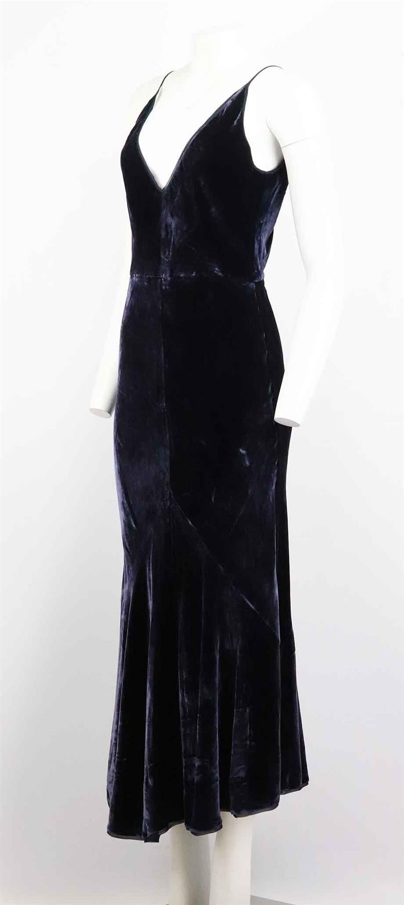This ‘Bridget’ midi dress by Gabriela Hearst is made from plush velvet and trimmed with delicate chiffon, it is strategically bias-cut to hug the figure and cascade to a fluted hem. Blue velvet. Concealed zip fastening at back. 82% Rayon, 18% silk;